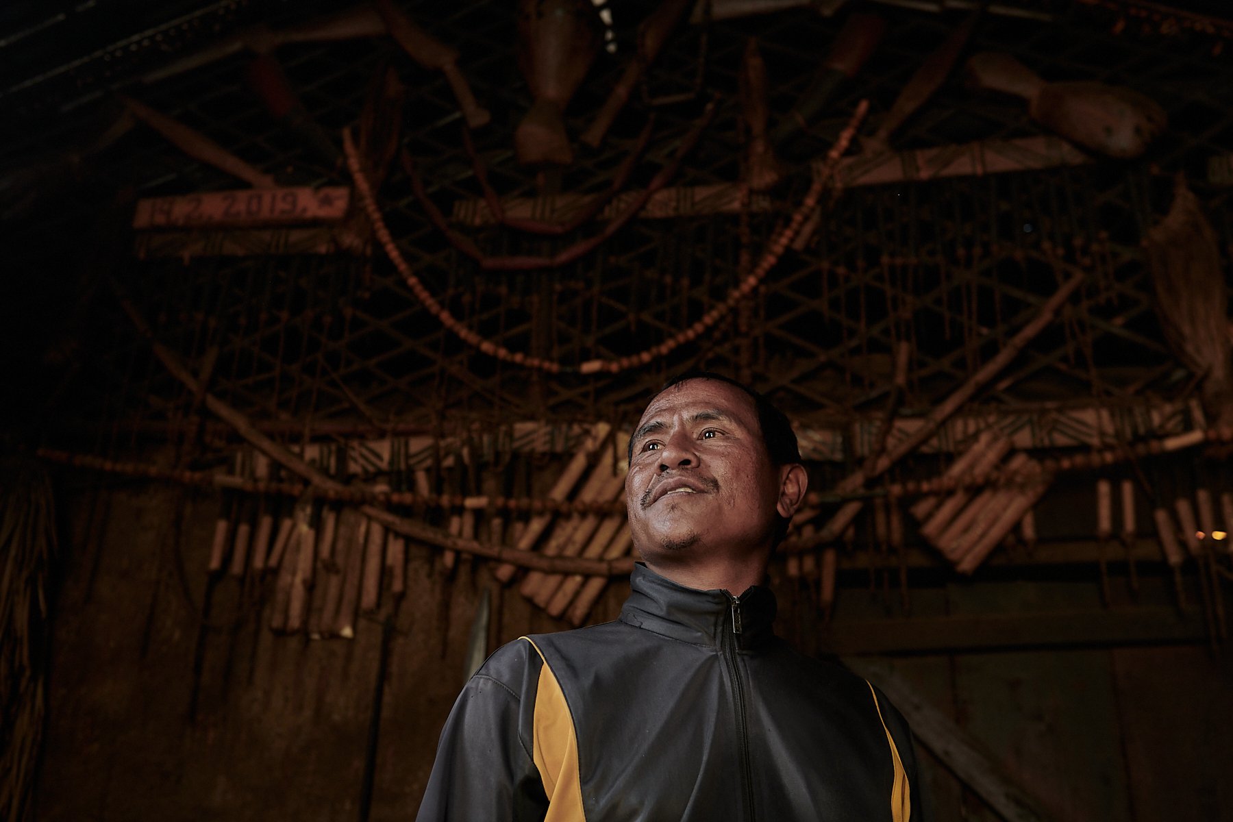 Michael, a modern Ao Naga, working as a guide for local visitors