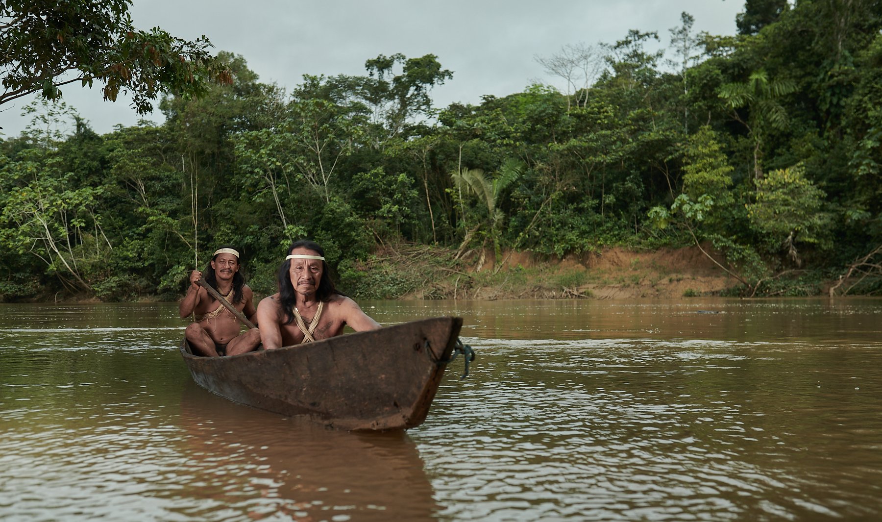 While most Huaorani now use fibreglass-covered long boats, for short trips, they still use traditional wooden canoes