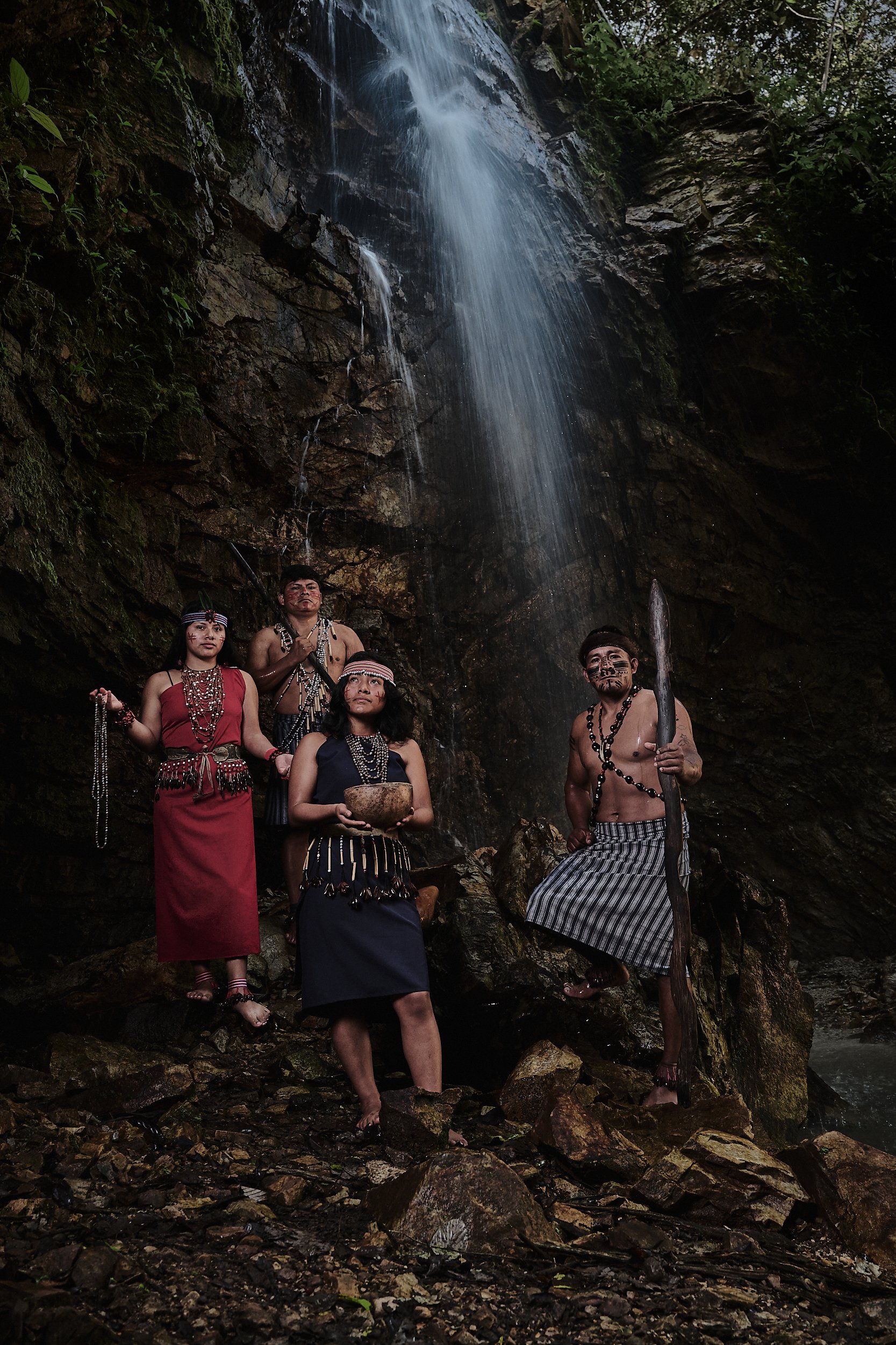 Members of the Shuar tribe on the Kinthia Panti (meaning Anaconda) waterfall