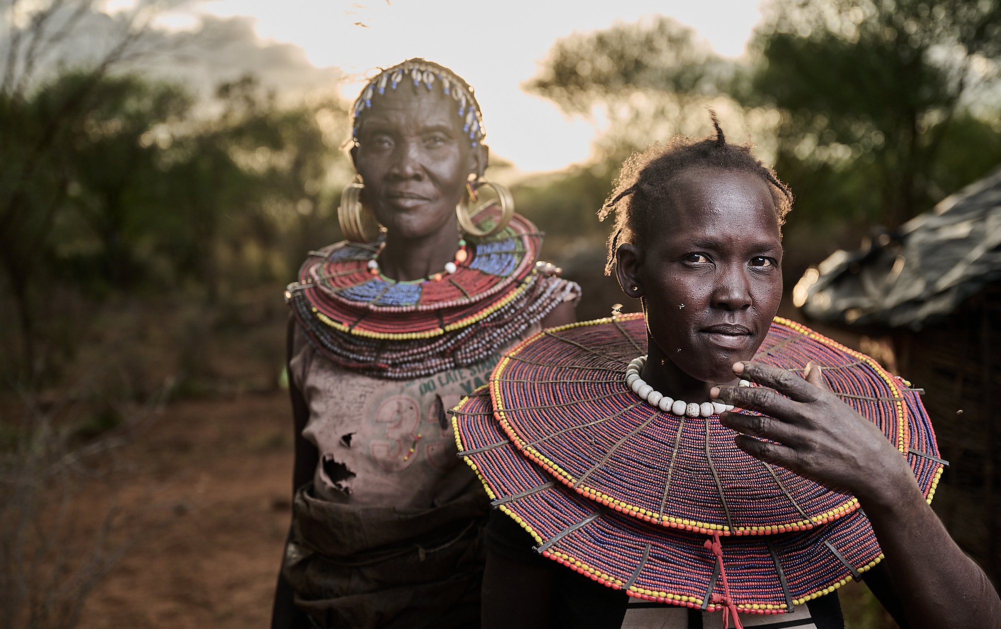 Pocket women wearing the traditional  neck decorations, Lake Baringo