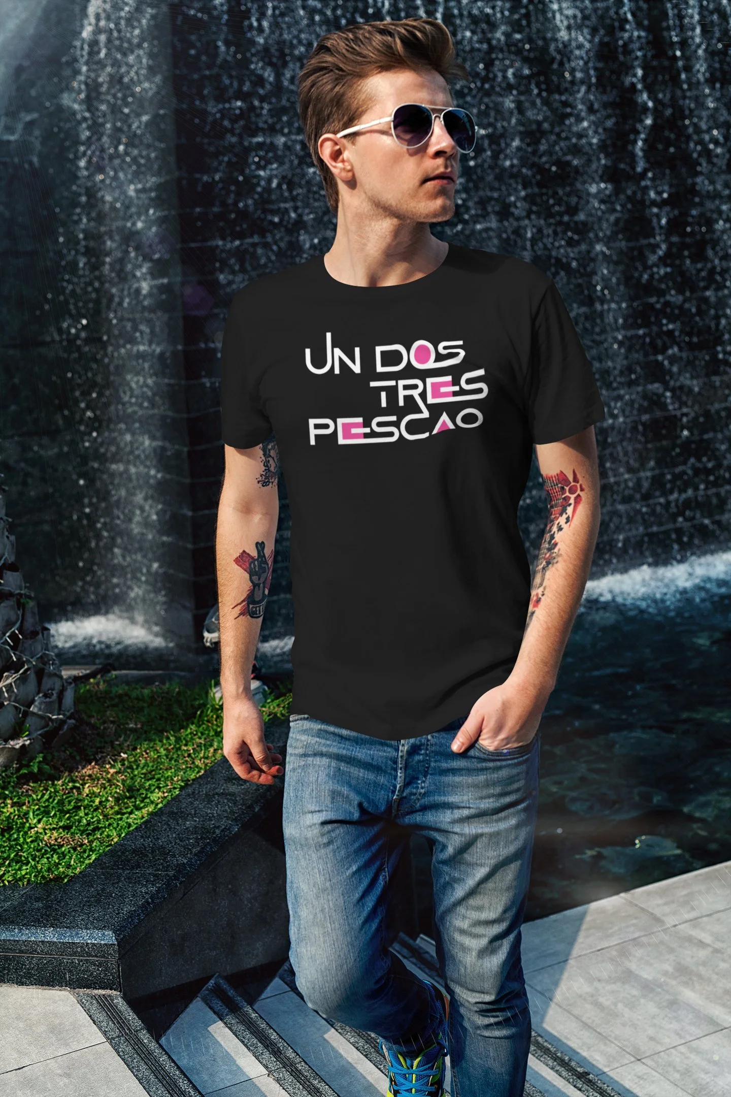 t-shirt-mockup-of-a-cool-man-walking-by-a-fountain-2190-el1 copy.jpg