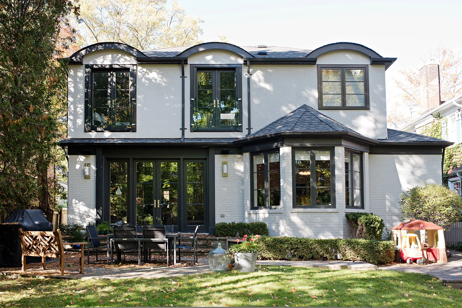 Back of house exterior design details by residential interior design firm, Four Blocks South, located in Toronto, Canada.