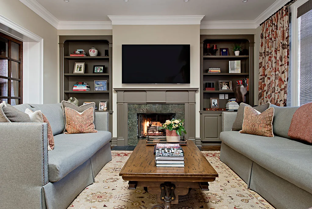 Rosedale living room with fireplace and mounted tv