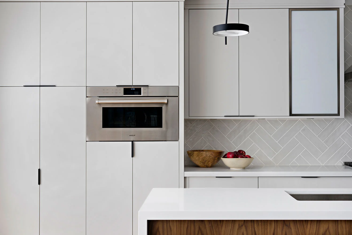Kitchen panel fronts with herringbone backsplash