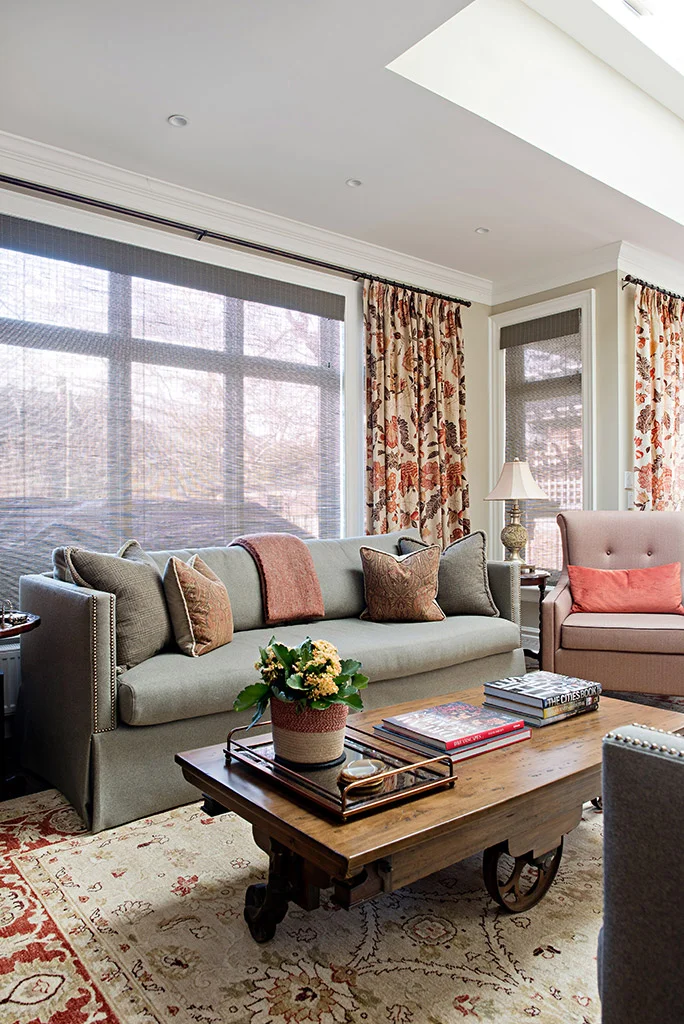 A traditional space might benefit more from a sofa with a shelter-style arm.