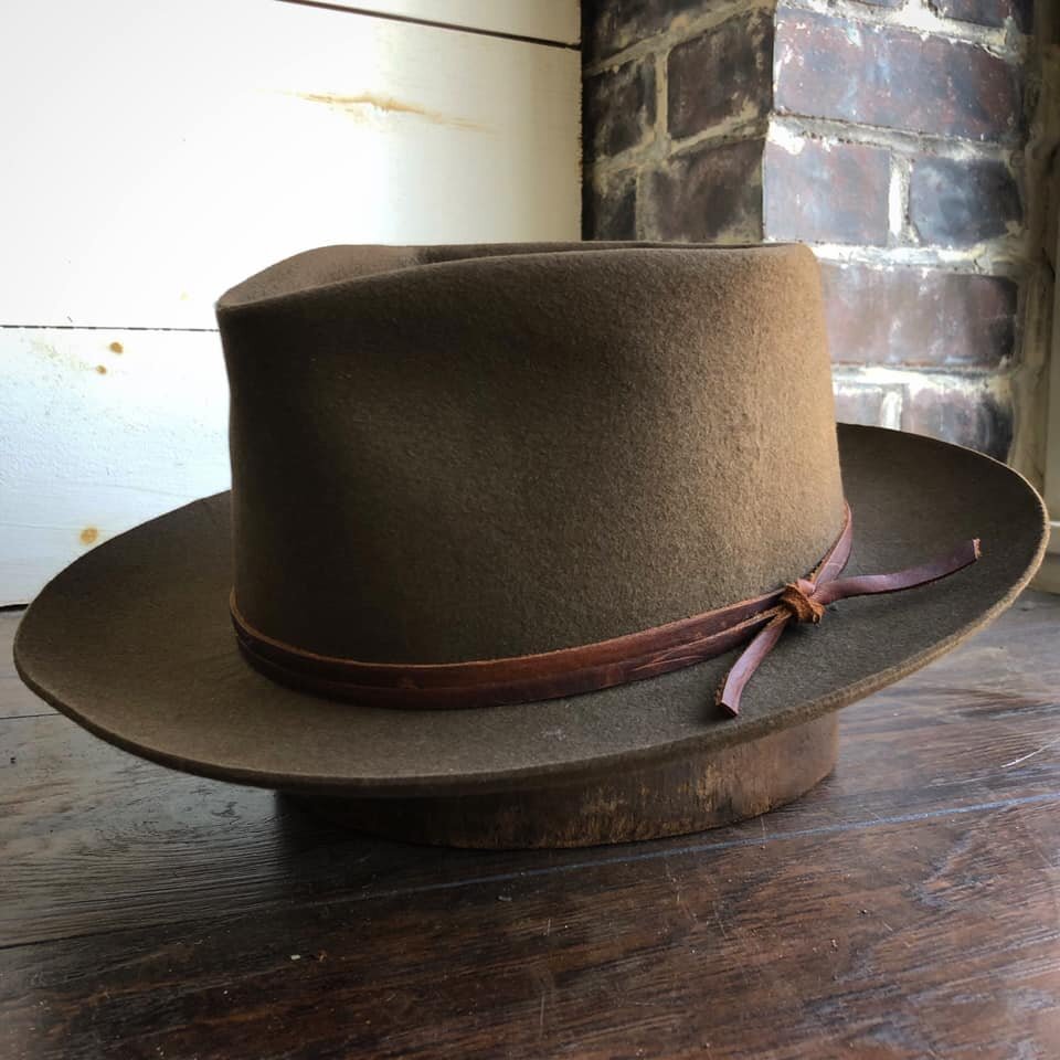  Pecan, dress weight, pure beaver.  Medium-low diamond crown.  2 3/4” flanged brim.  Brown leather outer. 