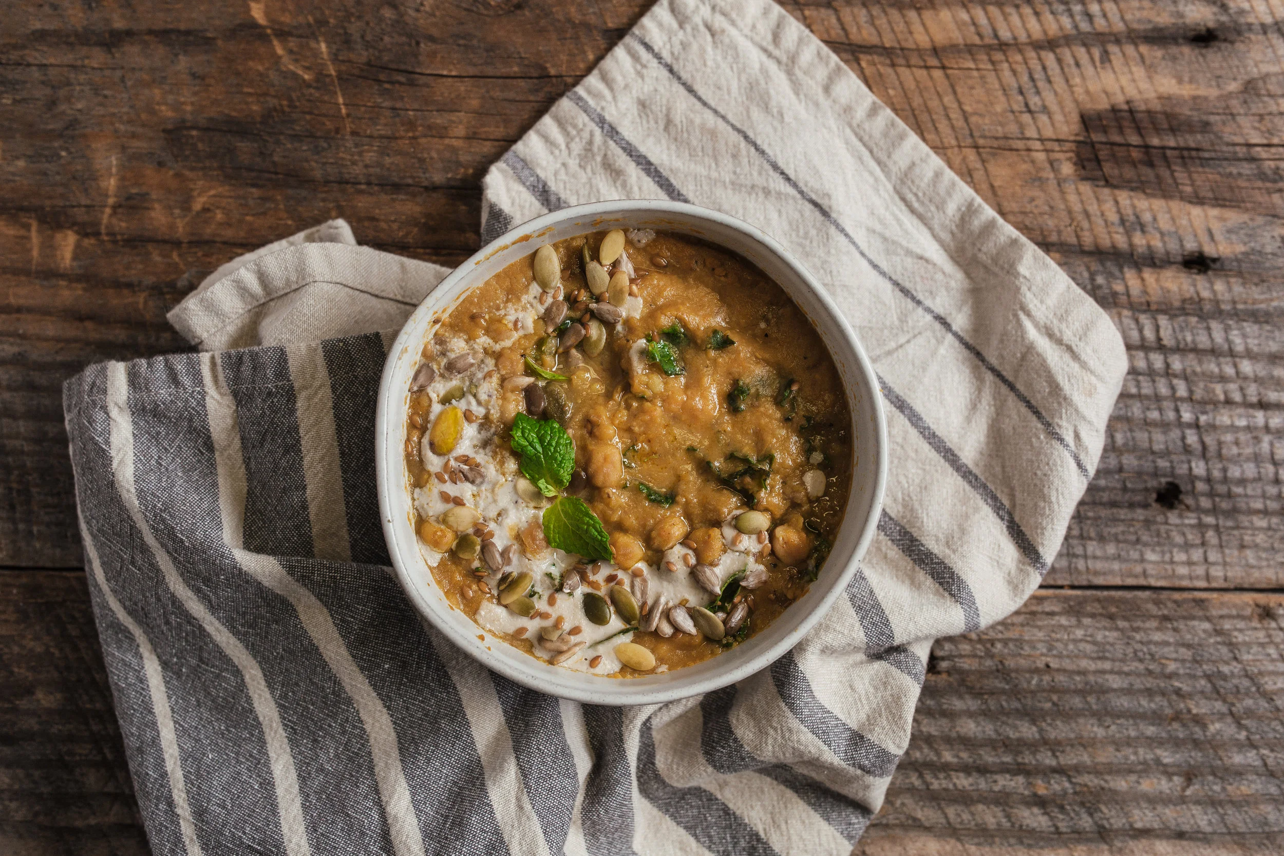 loaded lentil soup with chickpeas, kale and seed mix