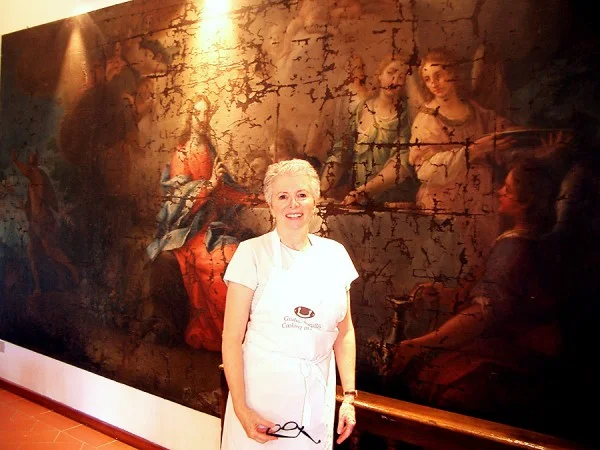 Sandy in dining room of cooking school