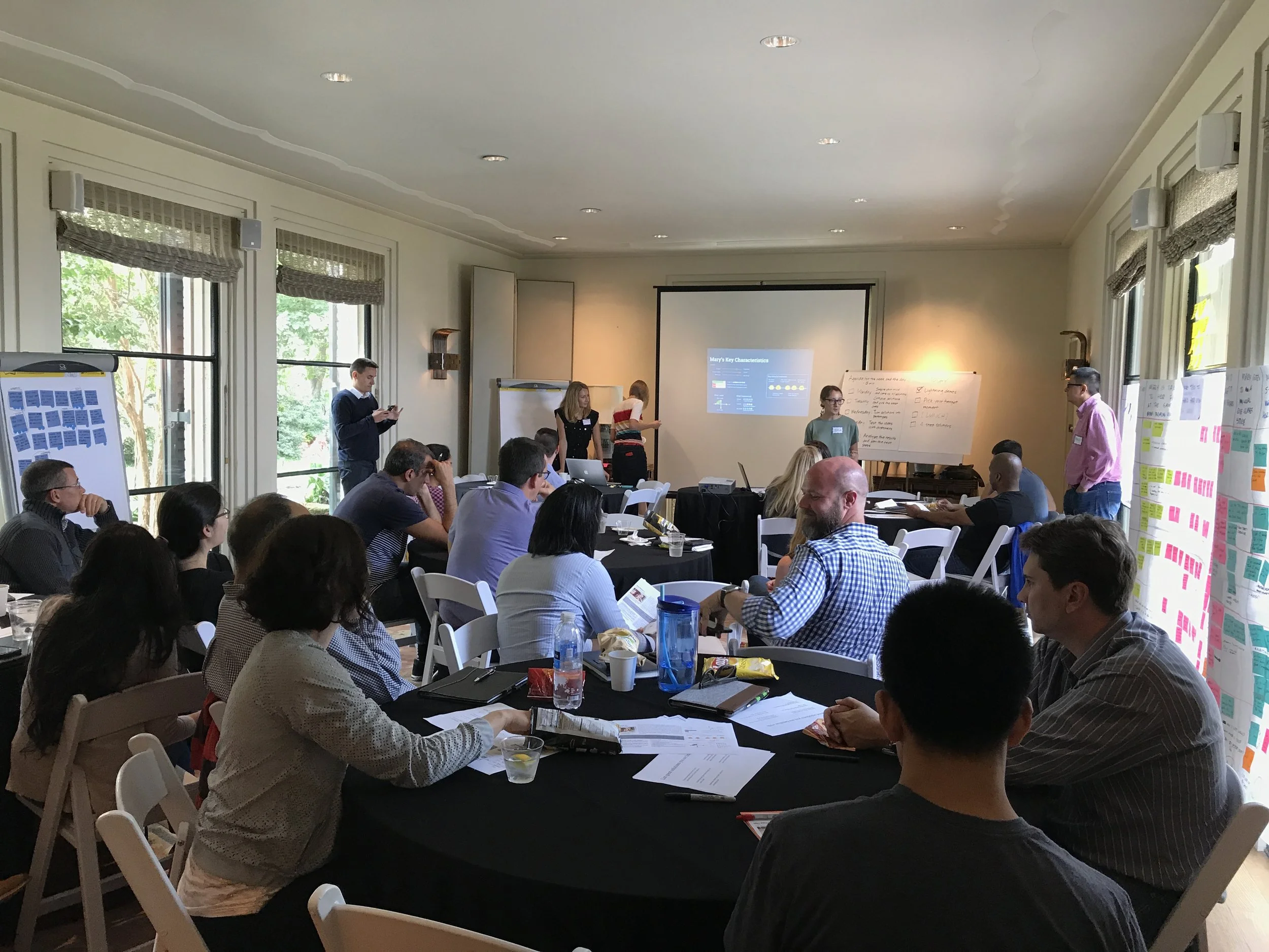 A group of people attending a service design workshop