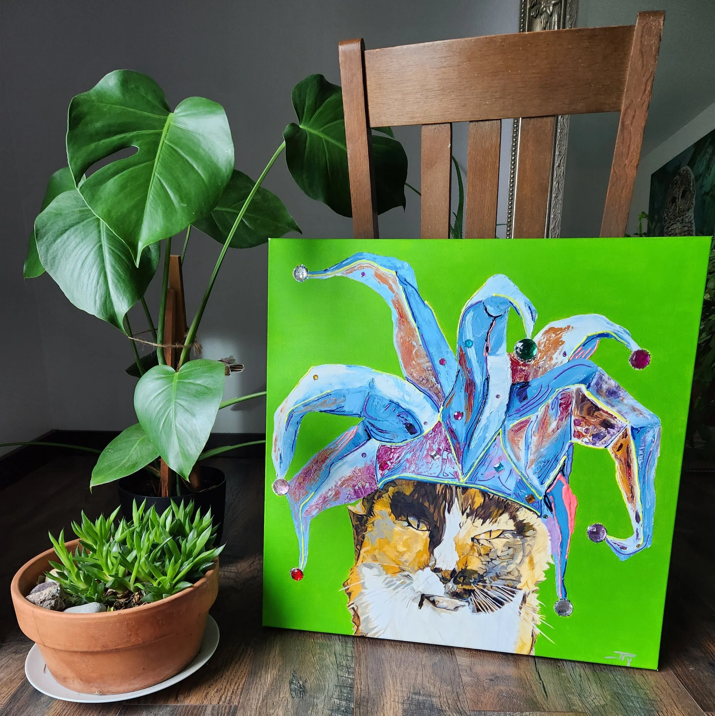 jester+cat+with+plant.jpg