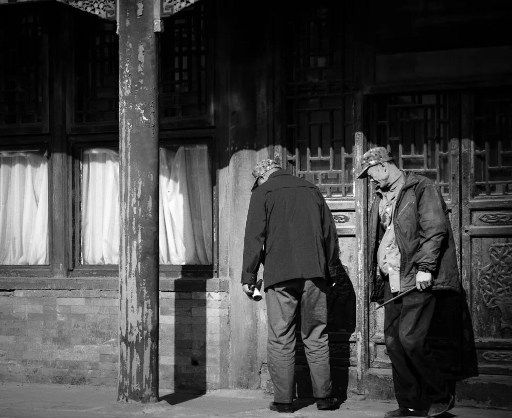 Men hanging out Summer palace, Beijing