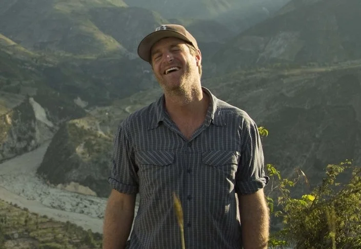 Adam Brown biologist and producer at Soulcraft Allstars hiking in mountains