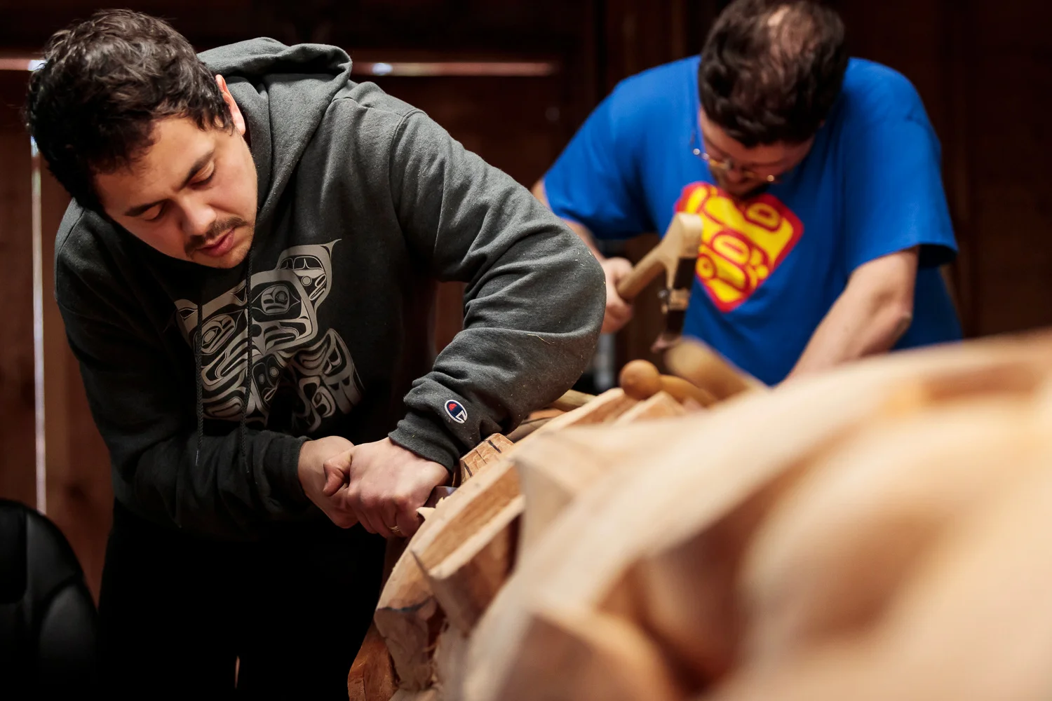 David Robert Boxley (back) and Clifton Guthrie (front) are Tsimshian Artist and Carvers living in Metlakatla, Alaska. When they were born 150 people spoke their native language. Now only, 3.