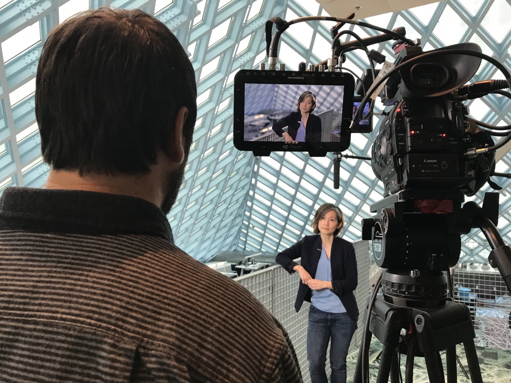 Director Aaron Straight interviewing Josie Watanabe of Seattle Public Library.