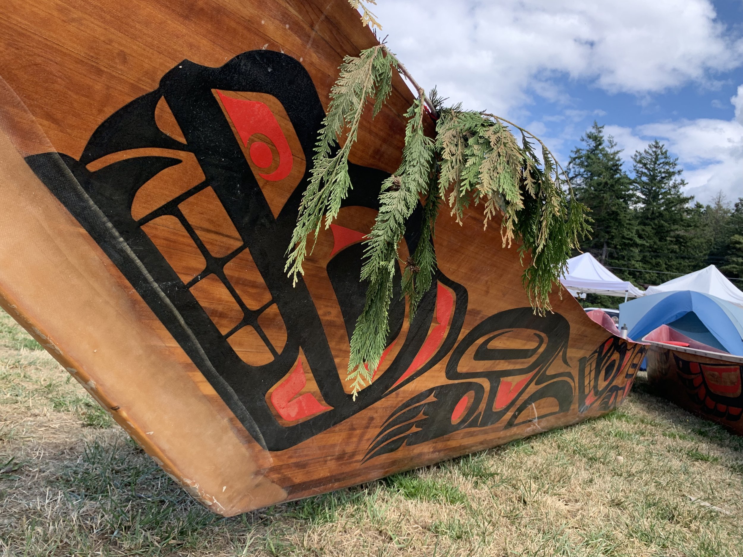 One of nearly 100 canoes paddle to Lummi Nation for the the 2019 Paddle to Lummi. Photo by Aaron Straight.
