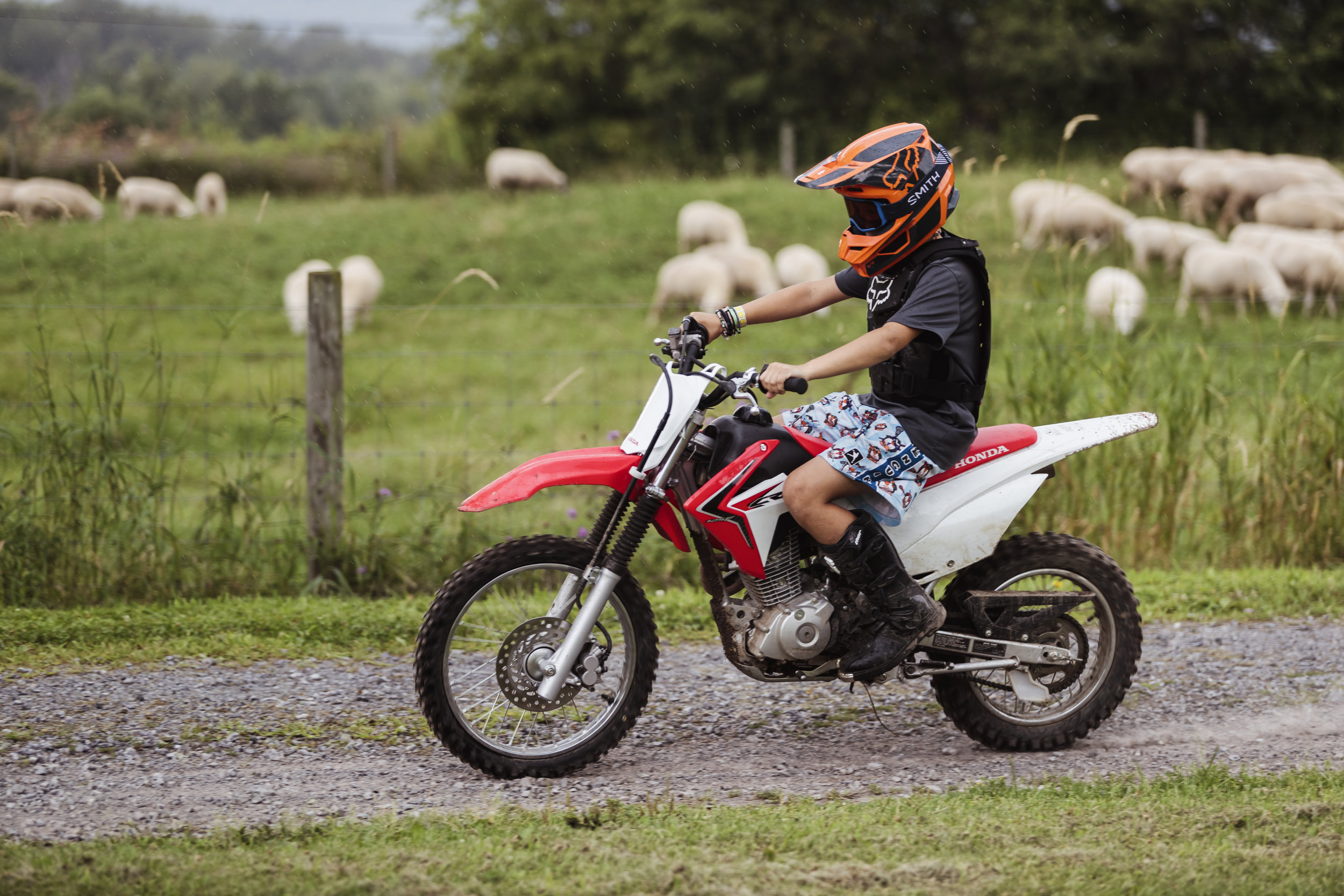 John is thankful for what their family's farming lifestyle provides for himself, his wife, and his children. Here is his son J.J. ripping around the farm on his motorbike.