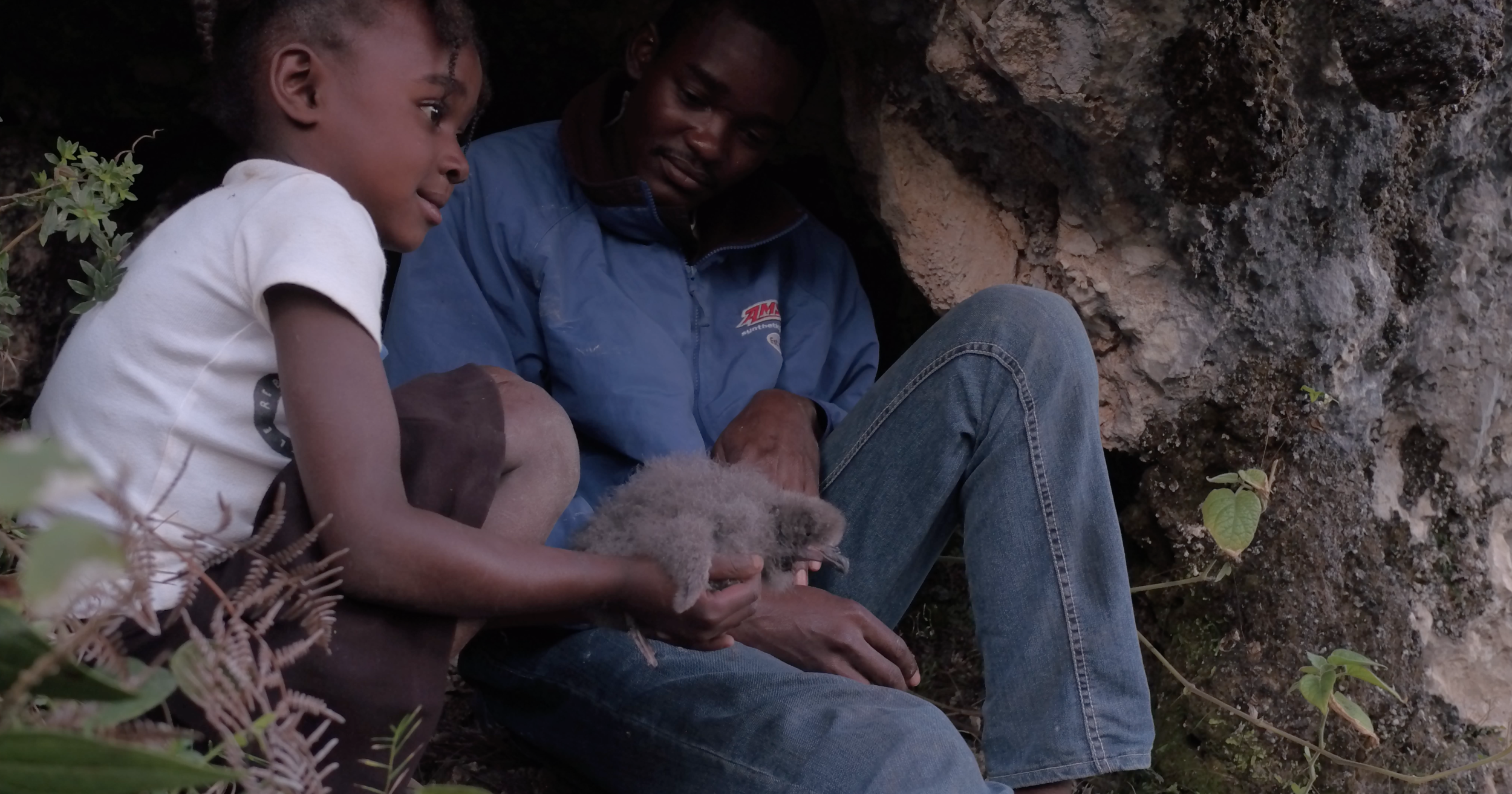 The next generation of Haitian farmer holds the next generation of Diablotin chic. This is the last part of the annual Diablotin Festival when the young children hike the mountain to pay tribute and pledge their support of the future Diablotins.