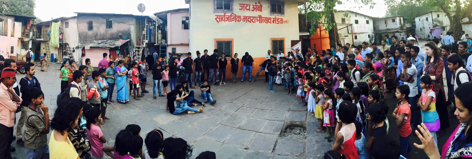 An image from a play performance in a slum in Mumbai, India where Ashley worked with GETheatre to devise a piece about issues in these young people’s lives.