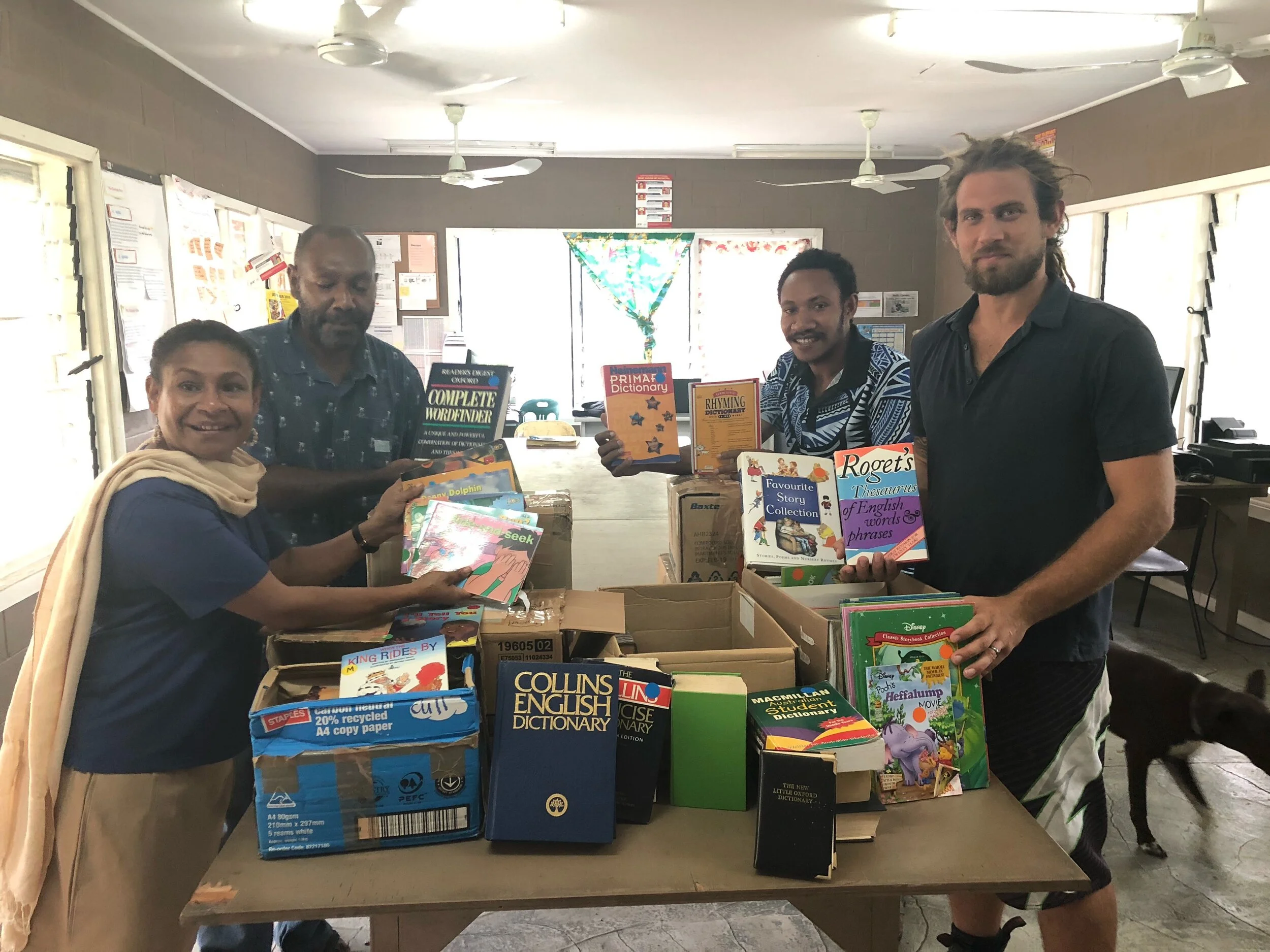 Oil Search Foundation donates reading books to City Mission’s new library.