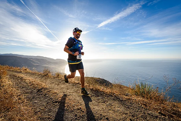 The author in the early miles of the Ray Miller 50K trail race, high above the Pacific.