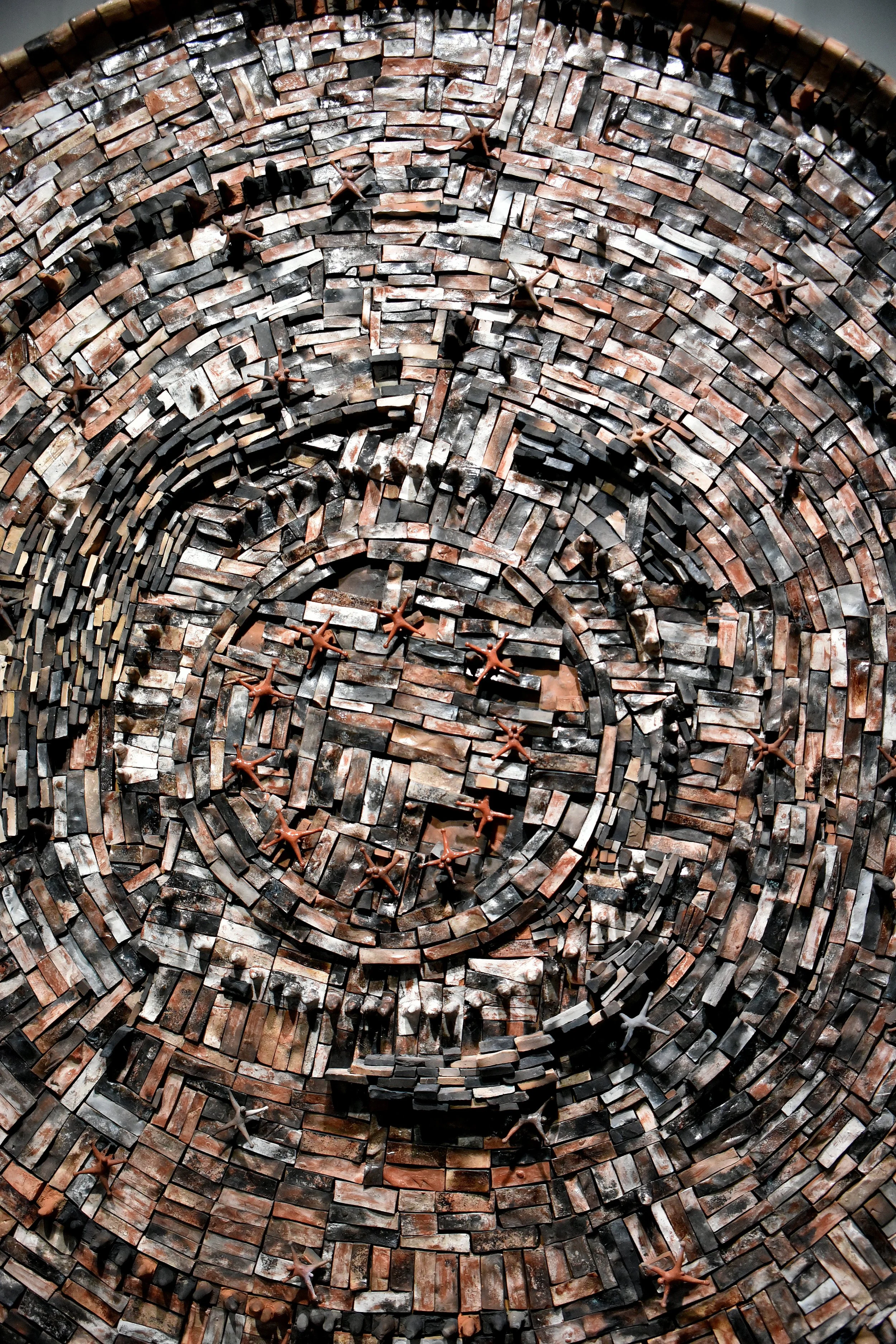 Details, “Plate - Man, where are you?”, Red clay, soot, glaze, engobe, polyurethane, wooden base, 14