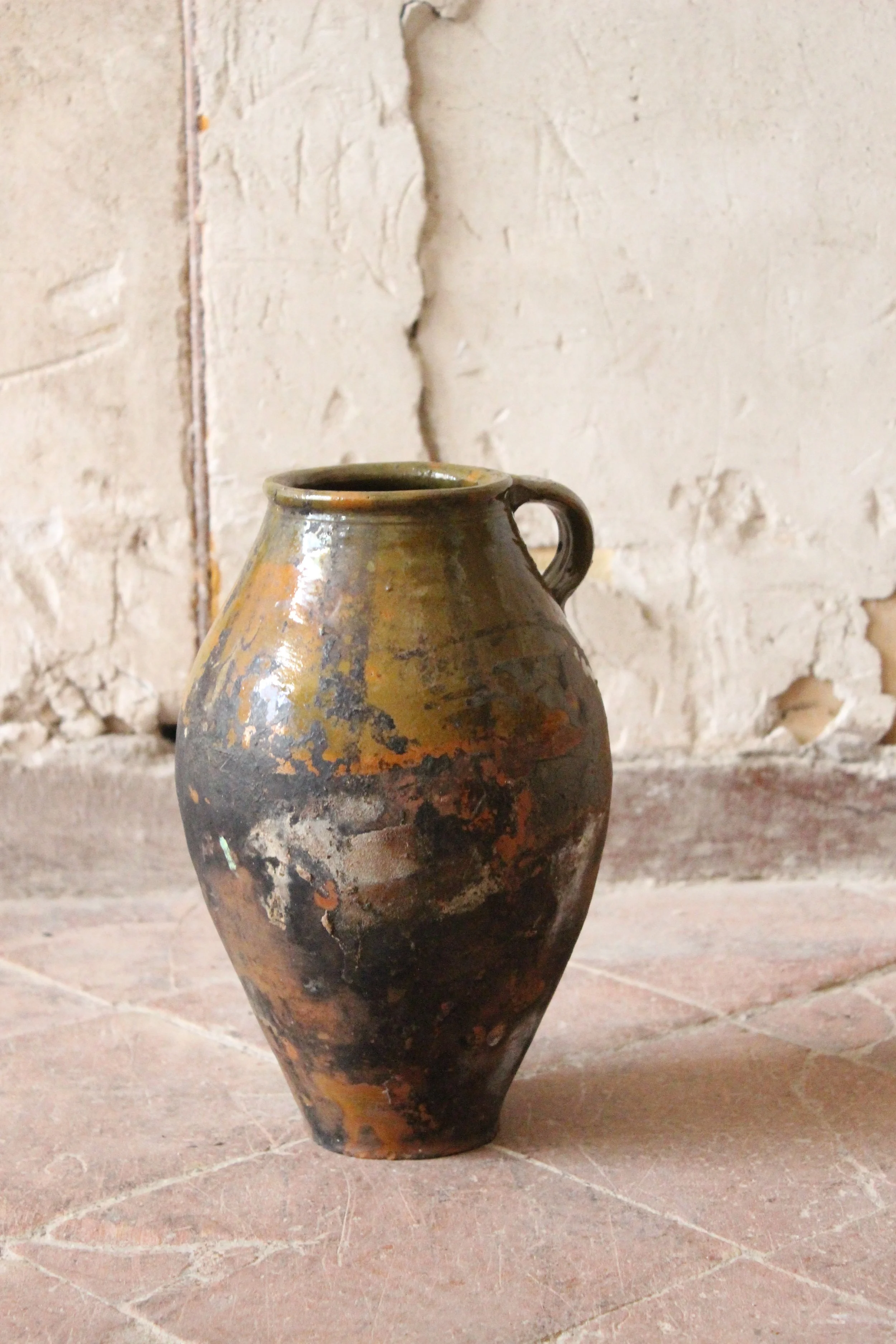 Ancienne cruche en terre cuite