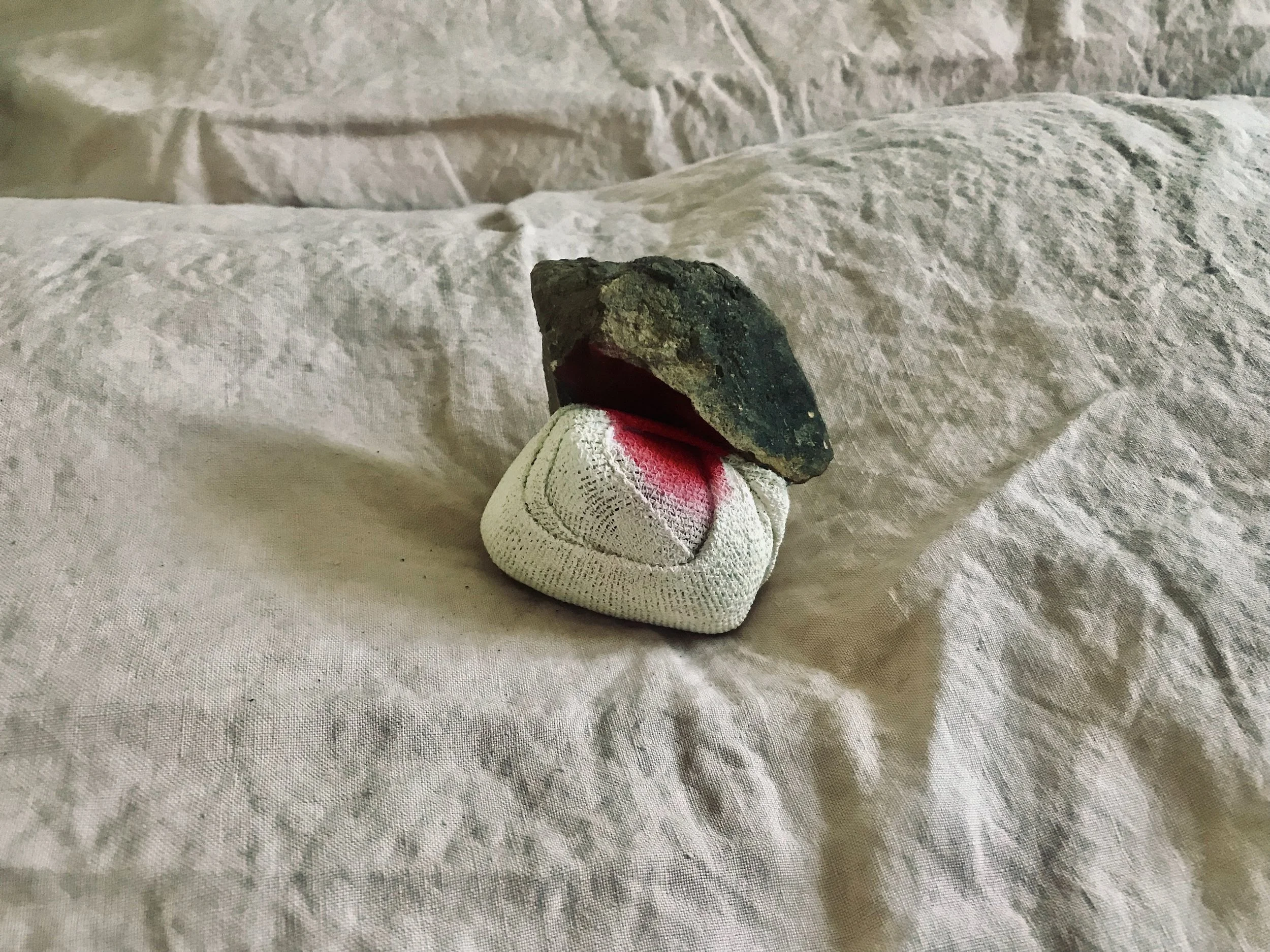 A Bleeding Rock, Claire Lee, Two rocks, bandage, red ink, 90 x 90 x 50 mm