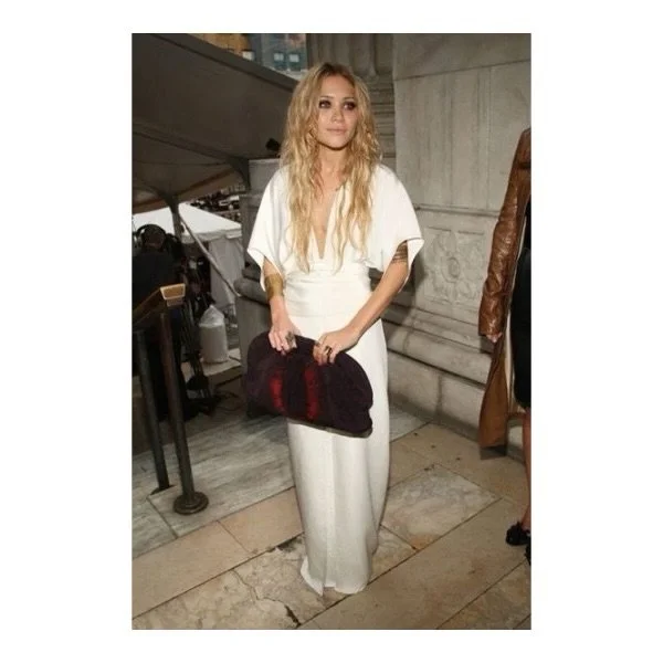 The joy of a kaftan means you can wear it simple and straightforward during the day and then really ramp it up for the evening. 

In this weather it ticks the boxes on so many levels. It remains to be an eternally glamorous and forgiving option for a