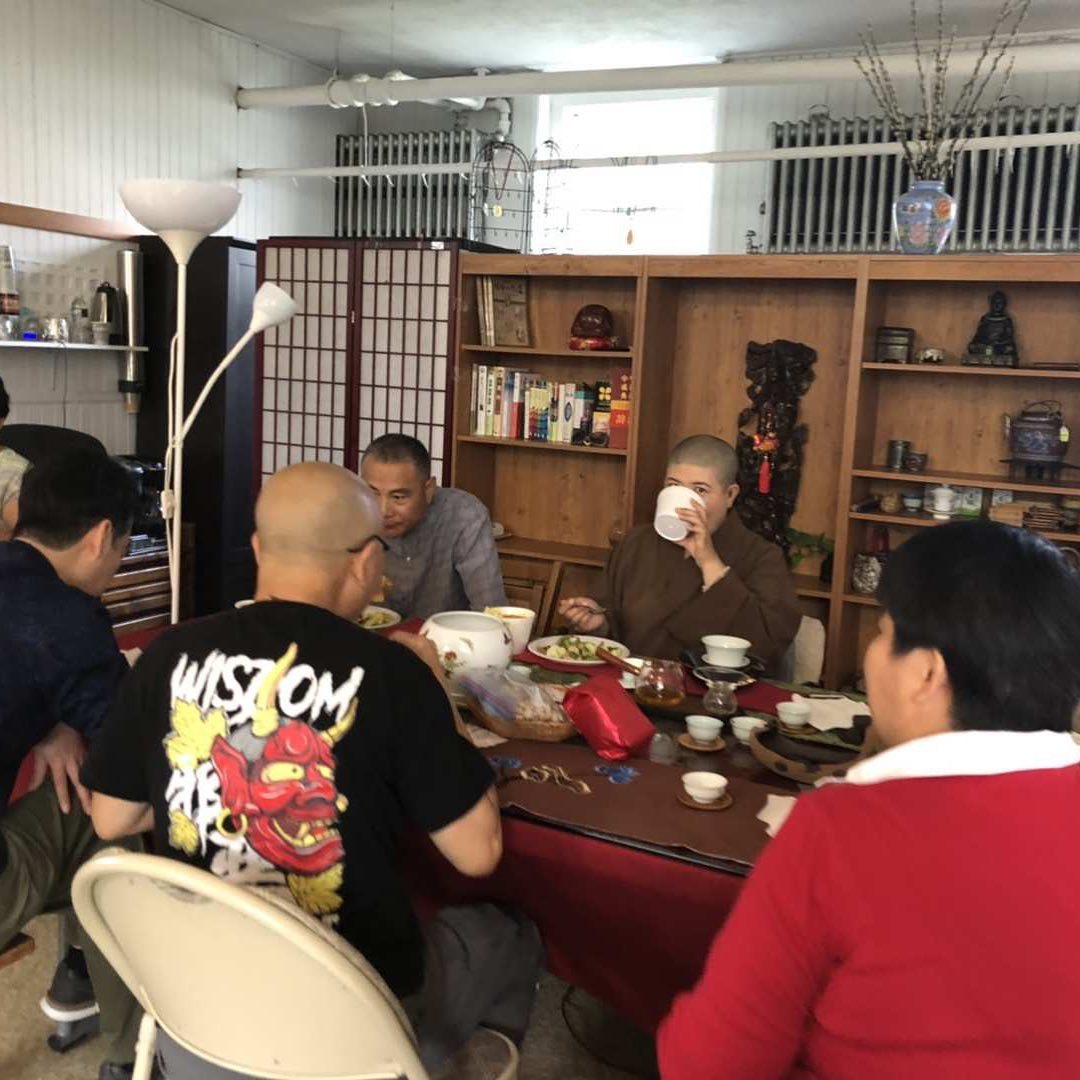 Enjoying vegetarian lunch and Wuyi mountain tea offered by Dr. Wu