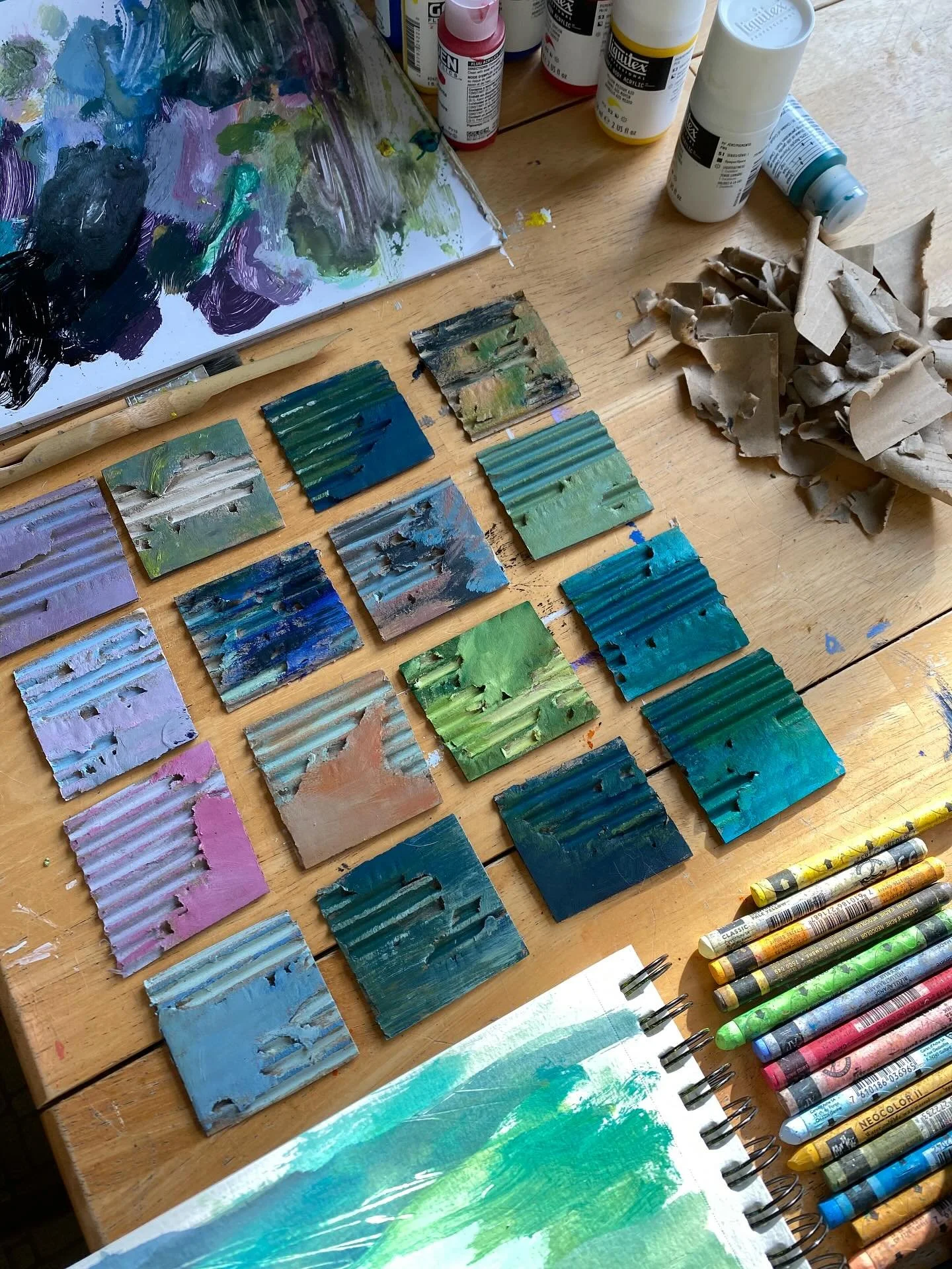 2x2&rdquo; squares of partially peeled cardboard. Using left over paint from yesterday&rsquo;s trees. They remind me of tiny landscapes. No plans what to do with these but paint on my hands is always a good day!!