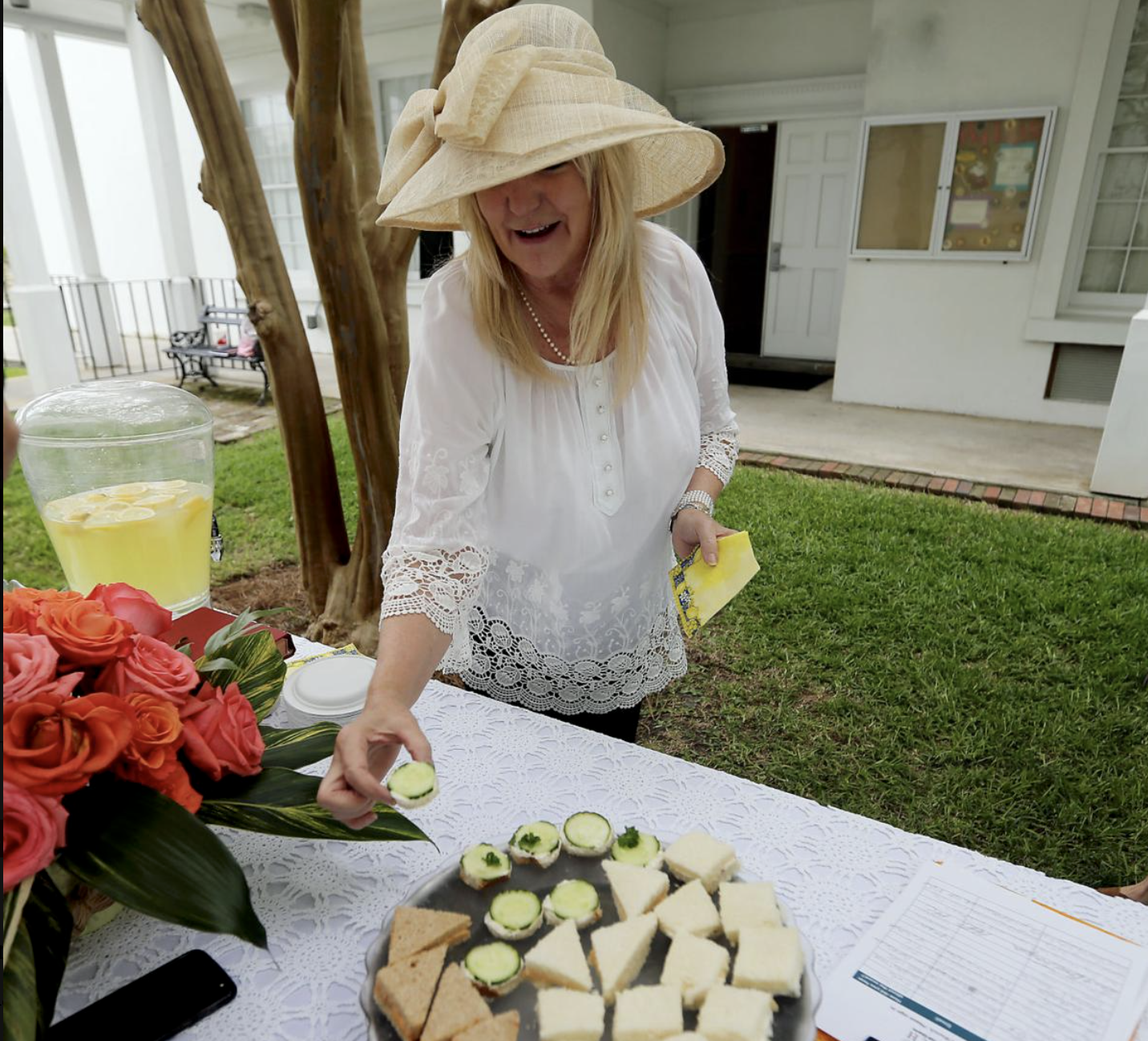 A Spirited Brunch participant enjoying delicious snacks offered during her visit.