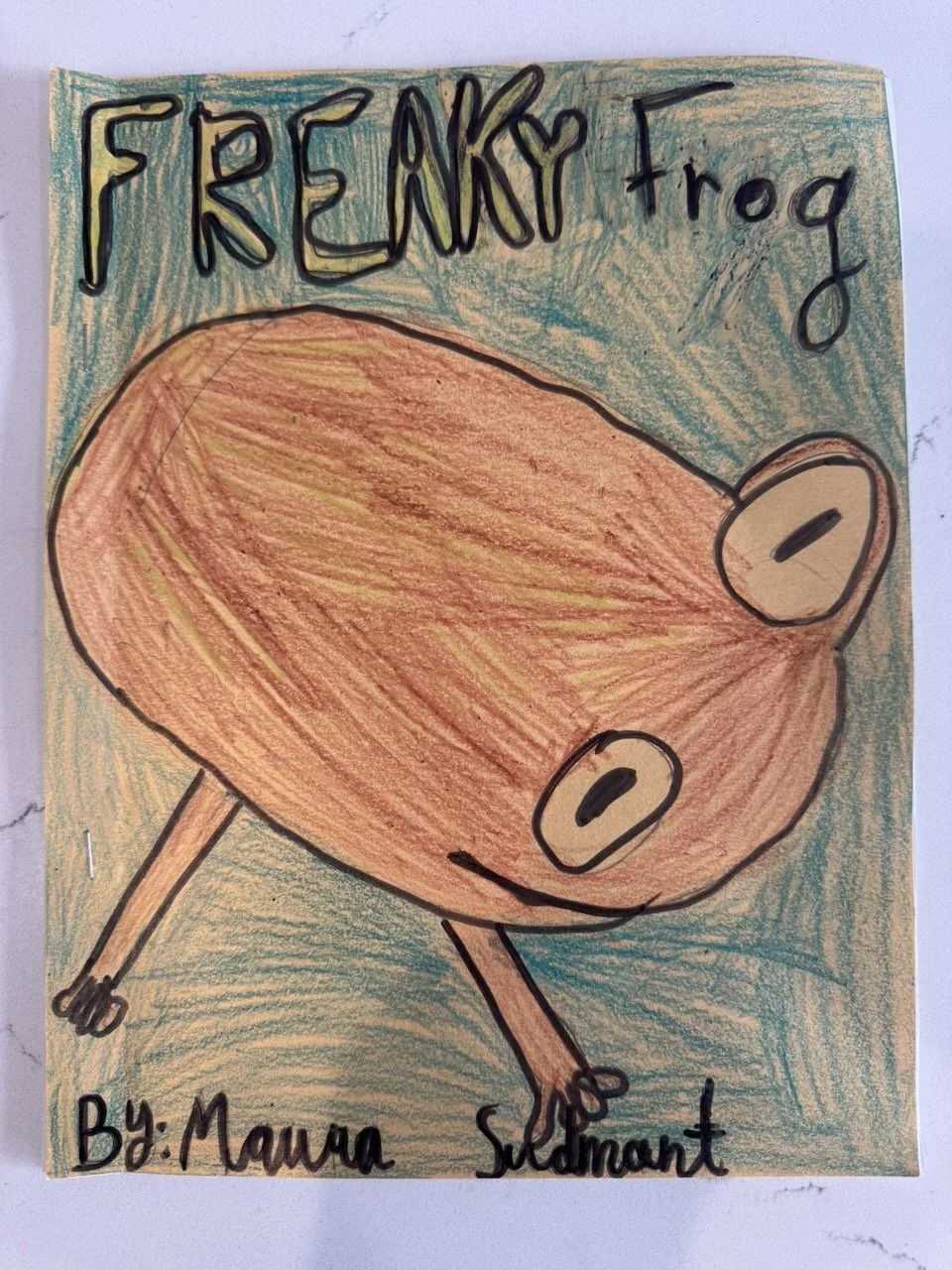   Maura  (9 years old)   Freaky Frog , 2026  Crayon and marker   Description:  A focused study on different kinds of frogs.   Artist background:  This piece of art was made as part of a class project to learn about frogs! 
