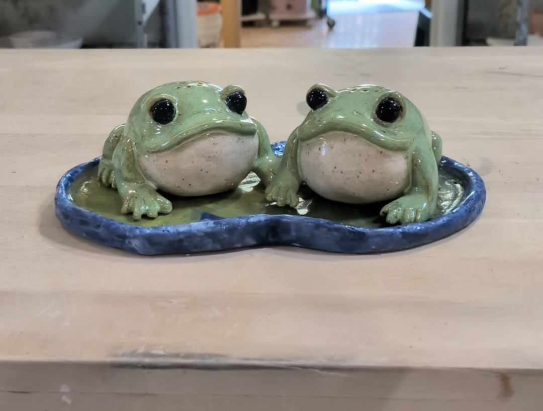   Rose Powell    Ceramic frogs   Ceramic   Description:  I make functional ceramics that look like frogs. This includes mugs, bowls, novelty salt and pepper shakers, ect. 