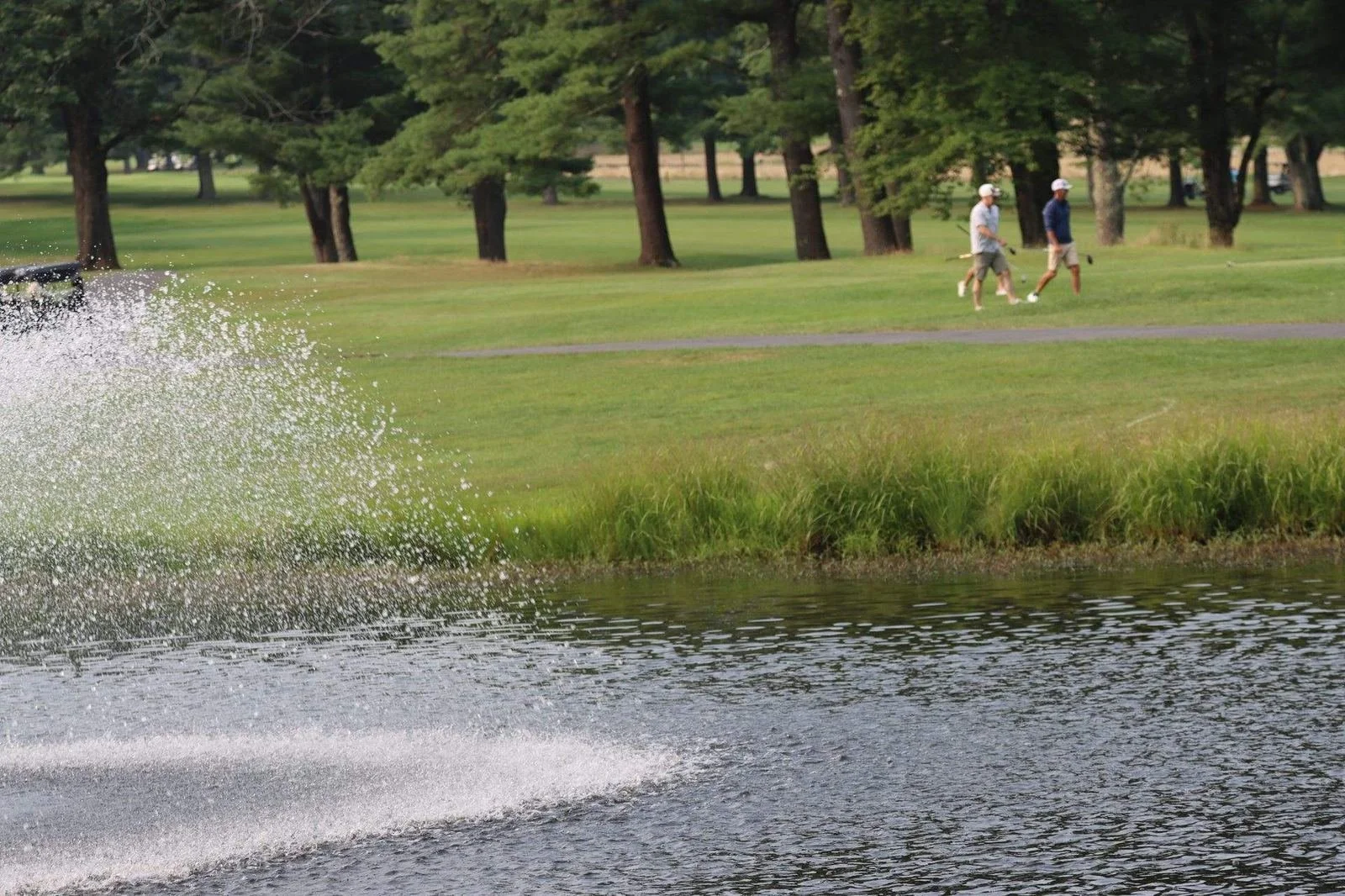 dannys-place-golf-tournament-water-hazard-course-scenery.jpg