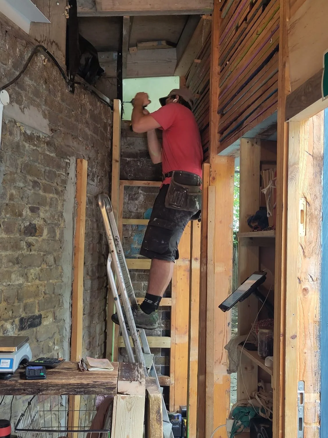 Our extension works are progressing. The till has moved! If you use a basket you can now place it on the shelf under the counter, making the flow much better. It’s not finished yet but getting there.
Our internal and external facing cupboards