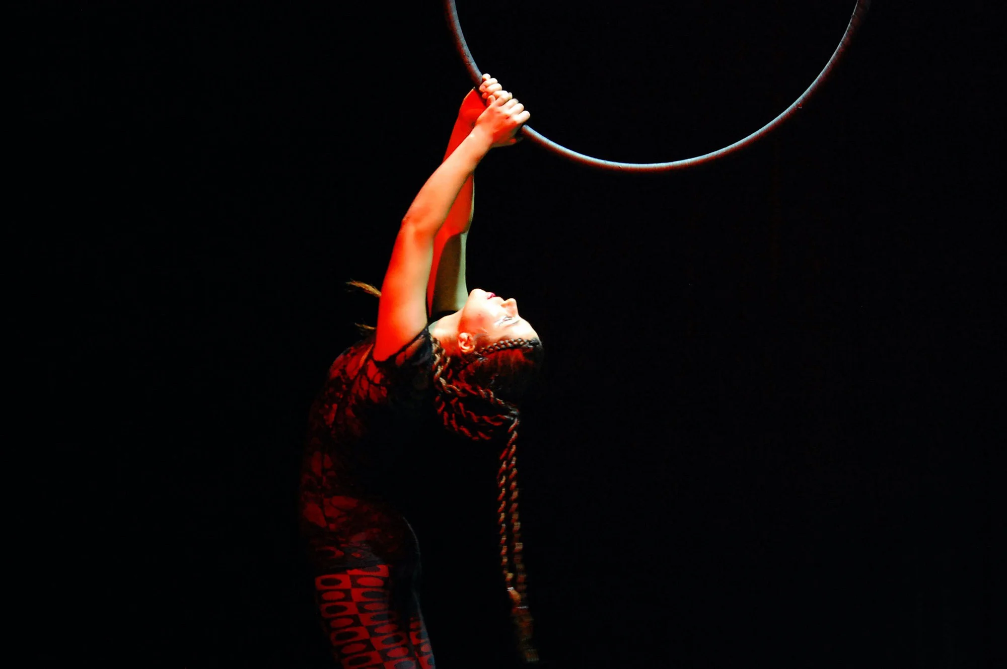 Gabrielle Ment performing one of her original aerial hoop acts