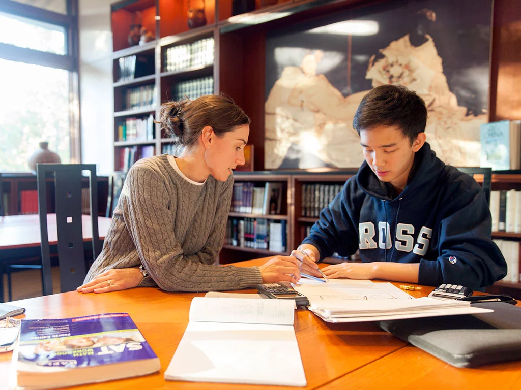 Ross School Teacher Providing Individual Support to Student.jpg
