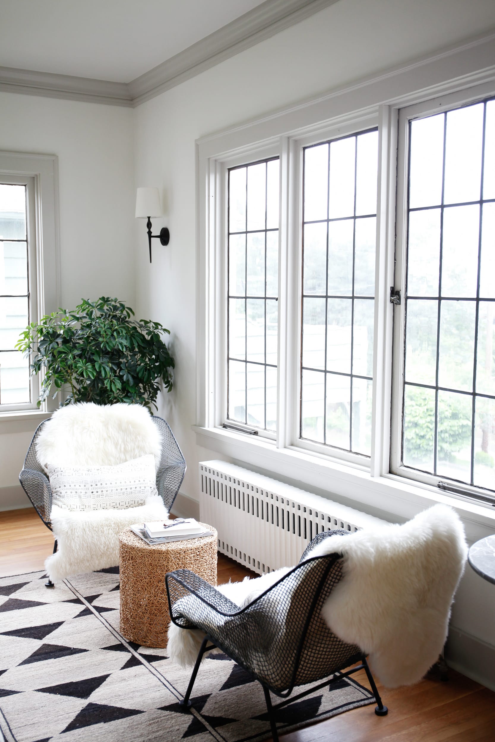 Industrial side chairs covered in fur throws