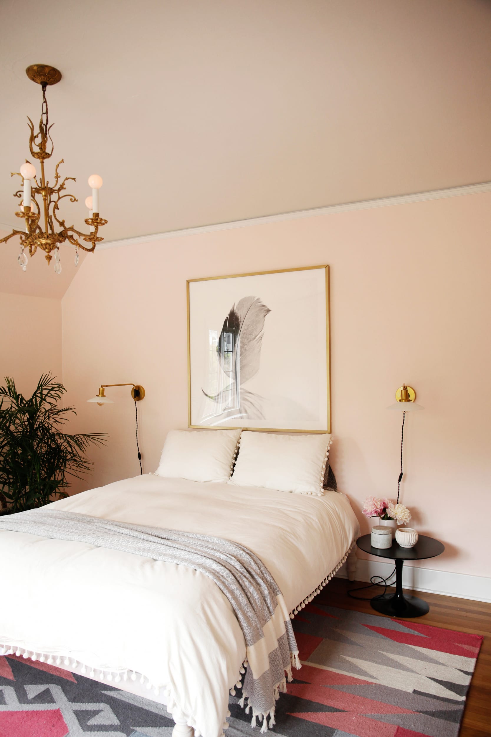 Pale pink walls in guest bedroom