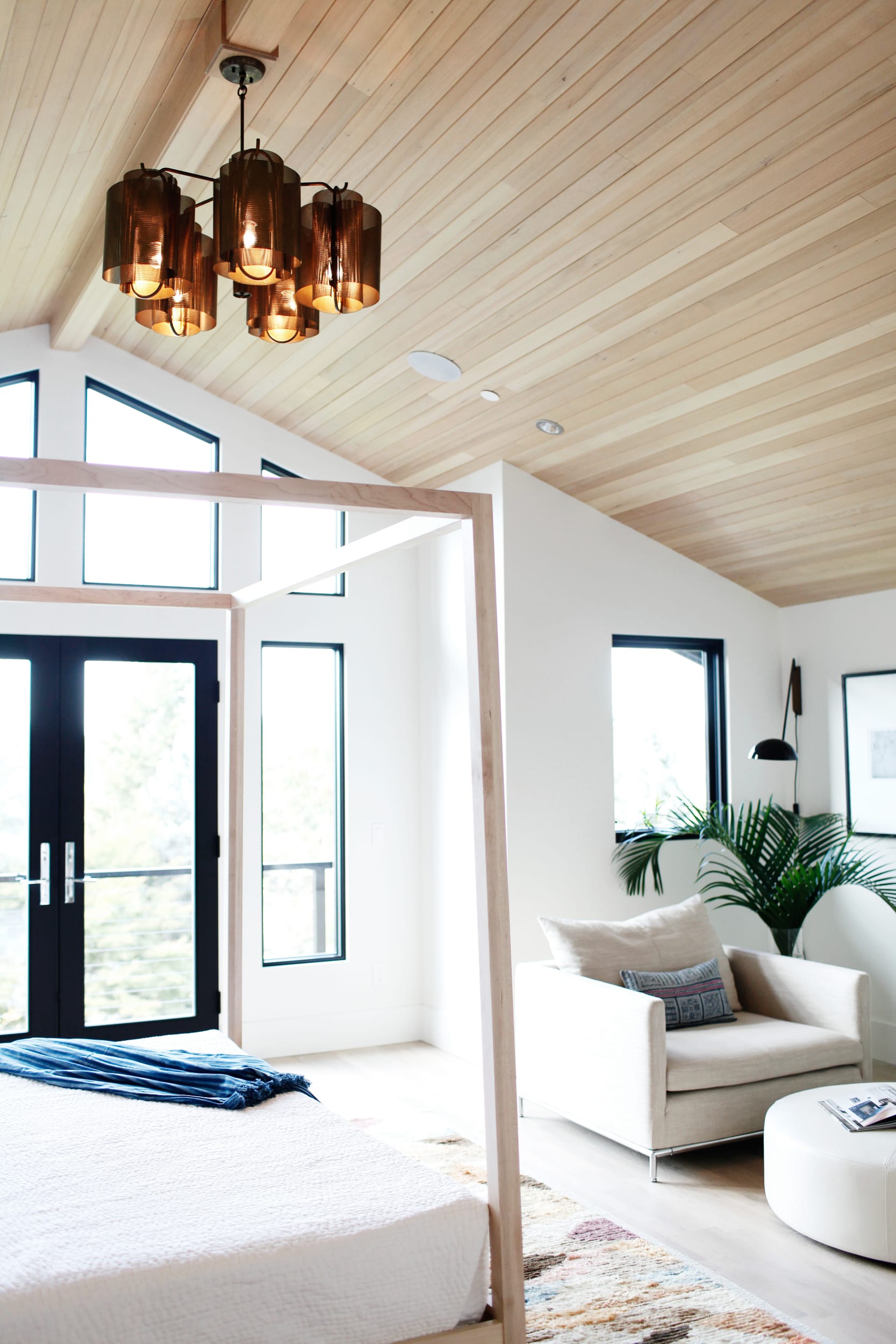 Wood paneled ceiling in master bedroom