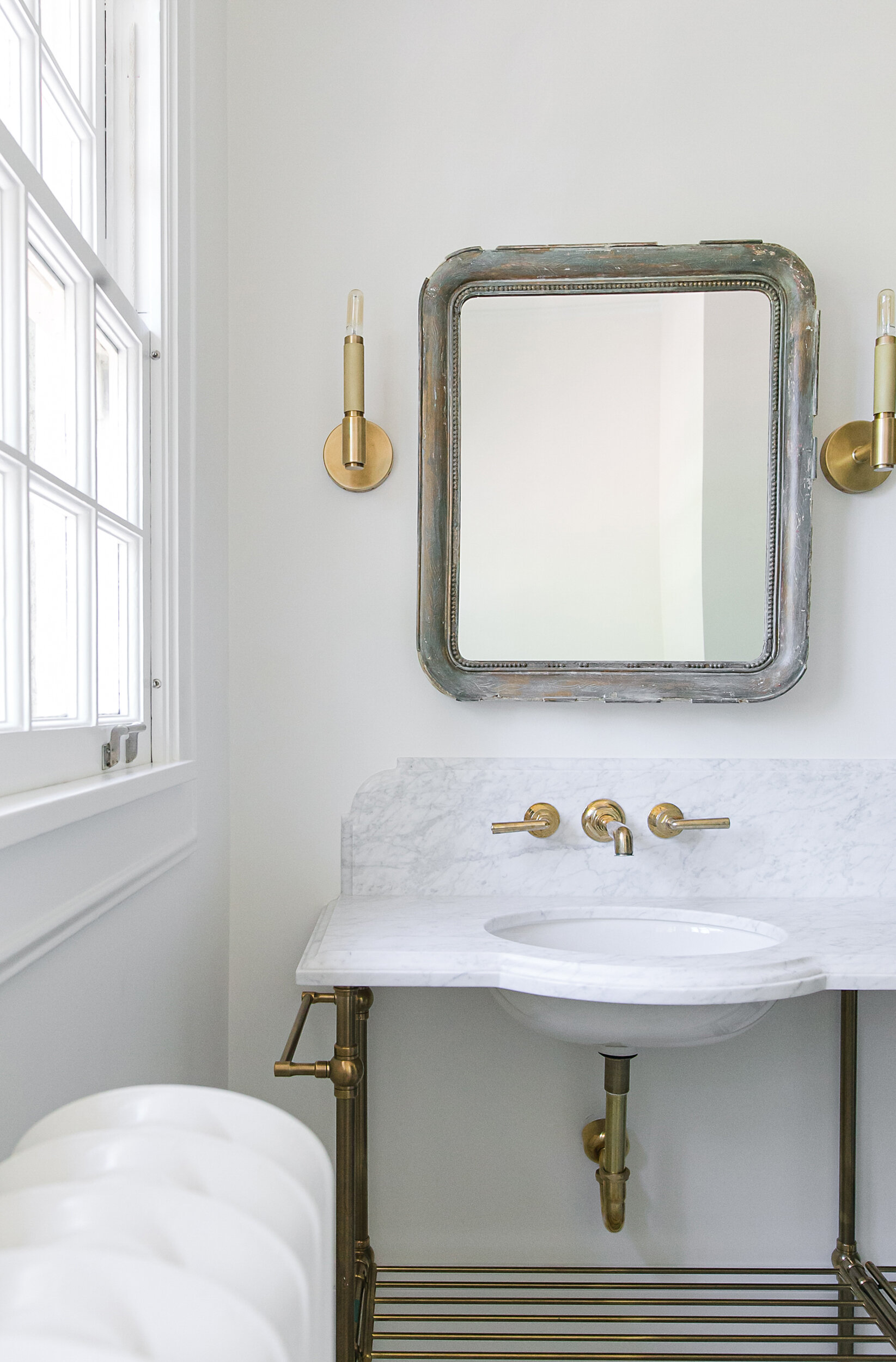 patina mirror in full bathroom remodel