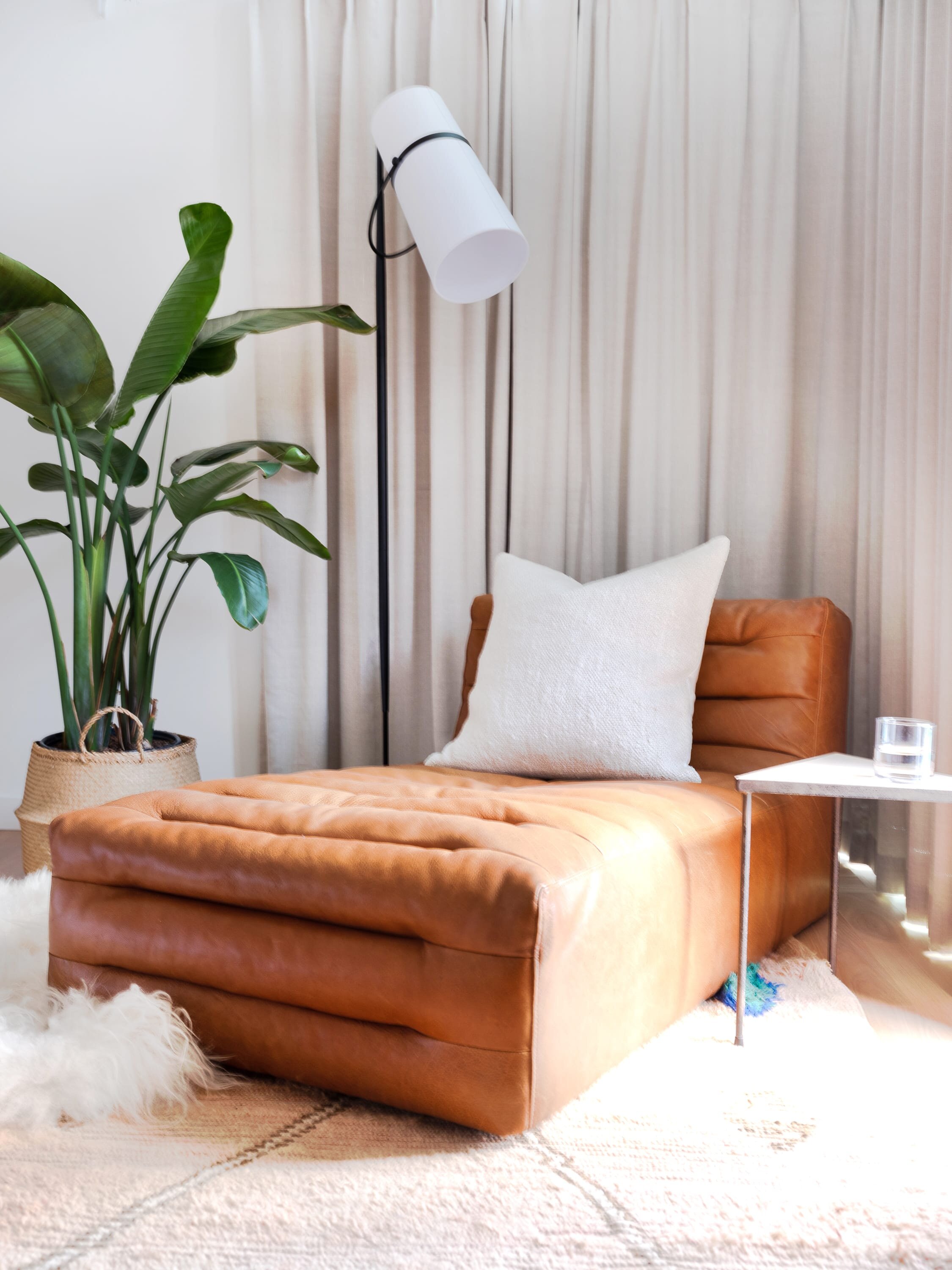 leather lounge seat with layers in bedroom