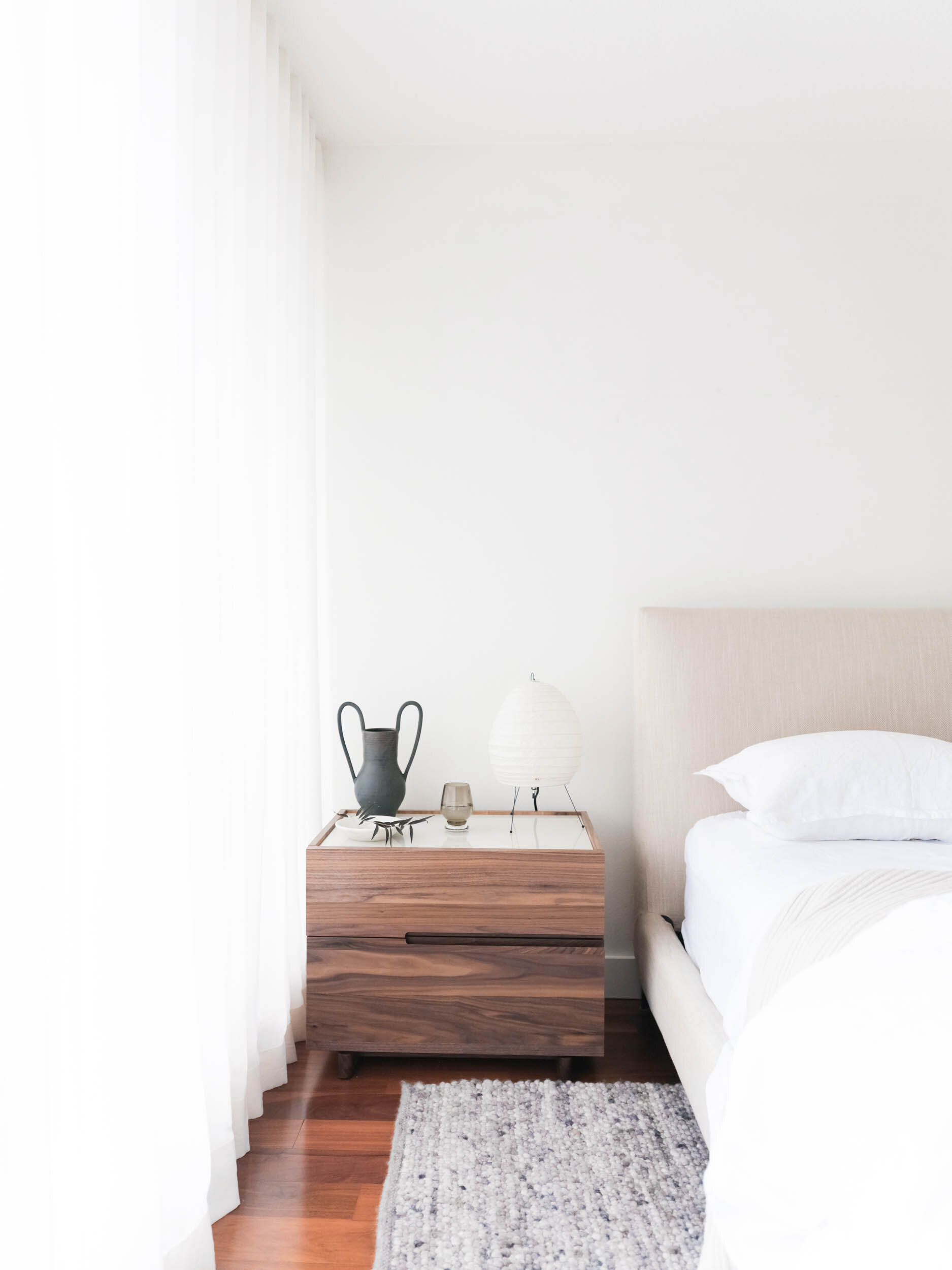 modern nightstand in Parisian inspired condo
