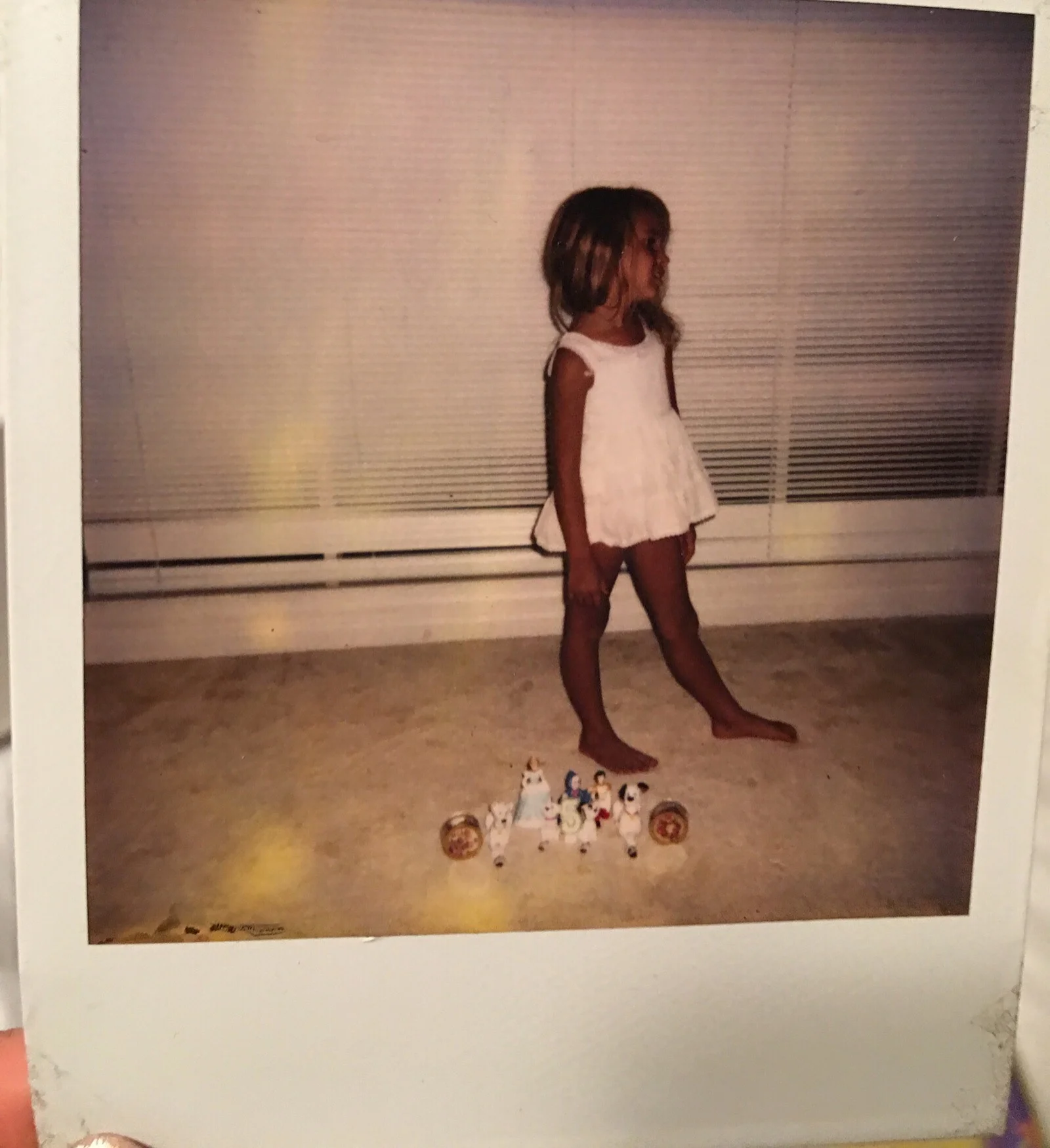 I remember this like it was yesterday! I begged my sister take this Polaroid of me “modeling” ....and duh my glass Dalmatians made the perfect scene