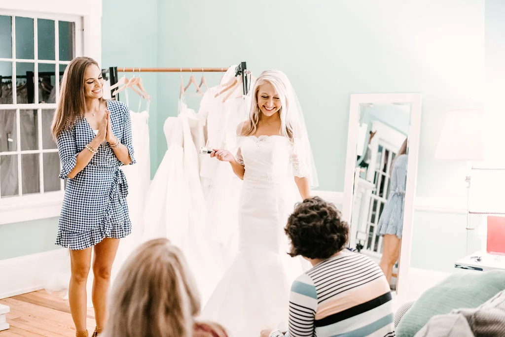 Kandyce Montgomery ringing the bell after deciding on ‘her dress’ for our shoot! Photo: Katey Keeton