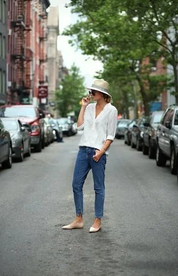 Have the hem of your jeans hit above the ankle bone for a perfect look when wearing flats.