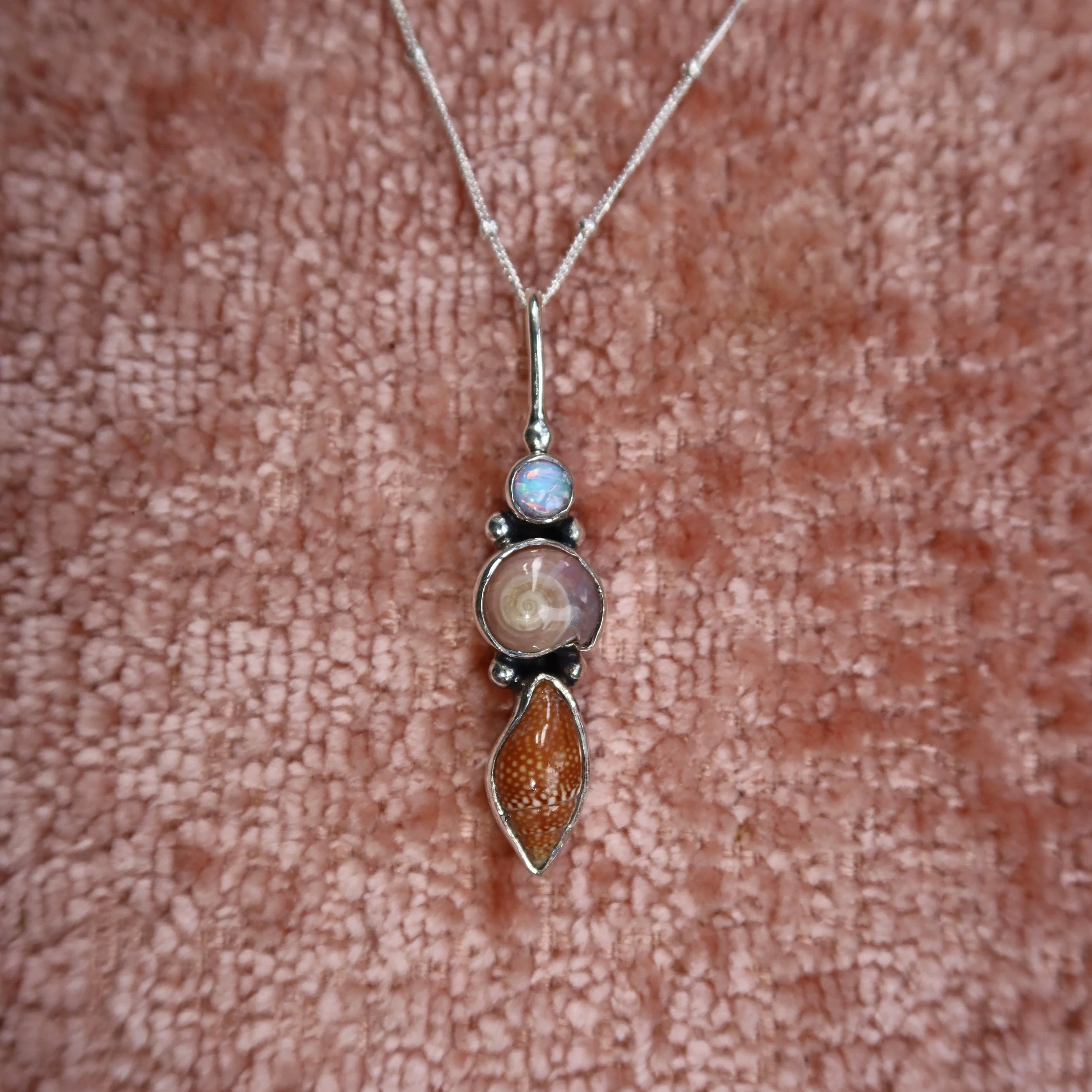 Pink Umbonium and Pyrene Shell Necklace