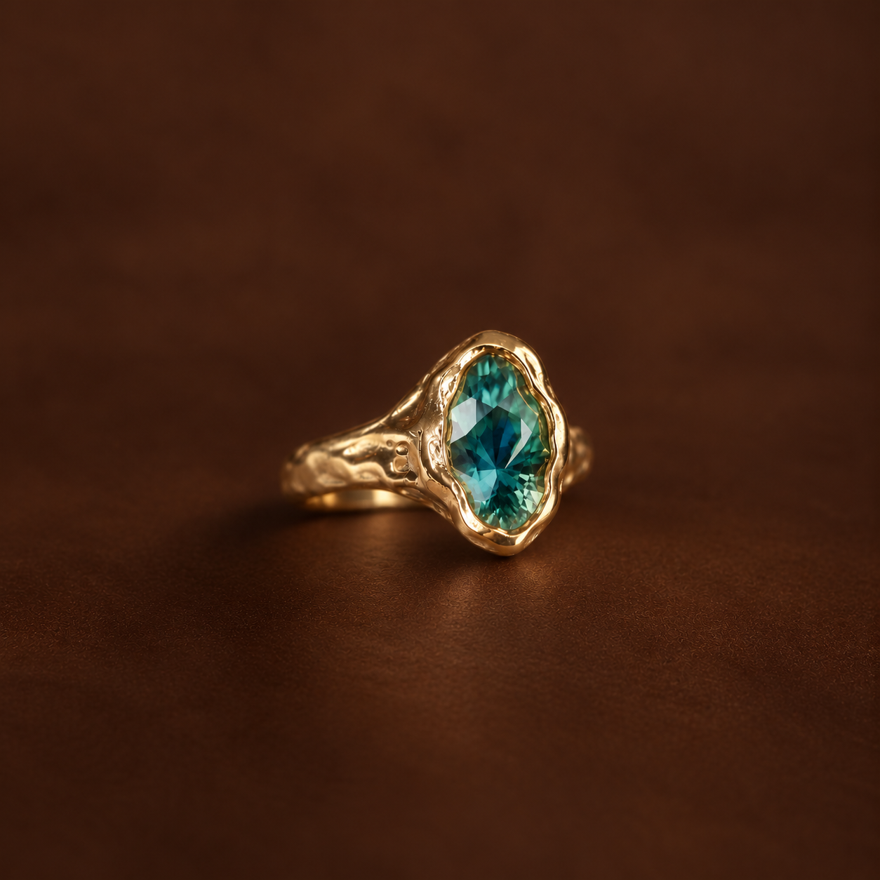 Molten Gold Ring with Teal Gemstone.png