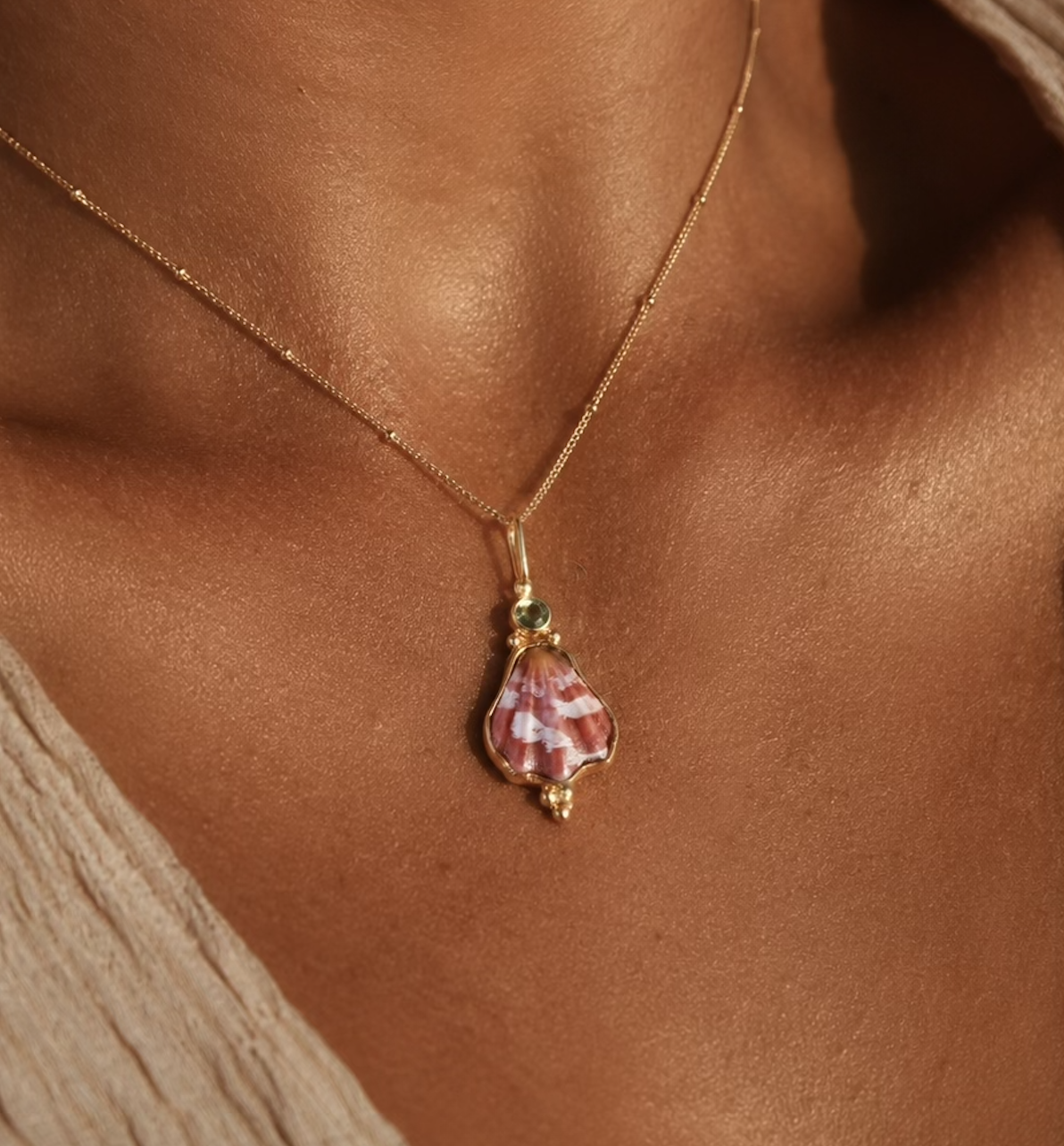 Gold Japanese Decatopecten and Green sapphire