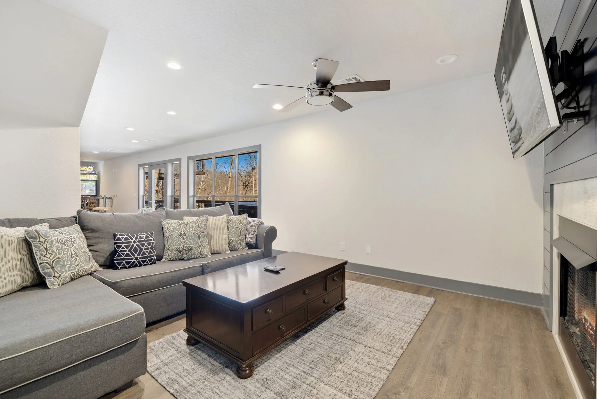 Plus, the seating area includes another a Smart TV above the fireplace. A perfect spot to cozy up on the couch and enjoy a show.